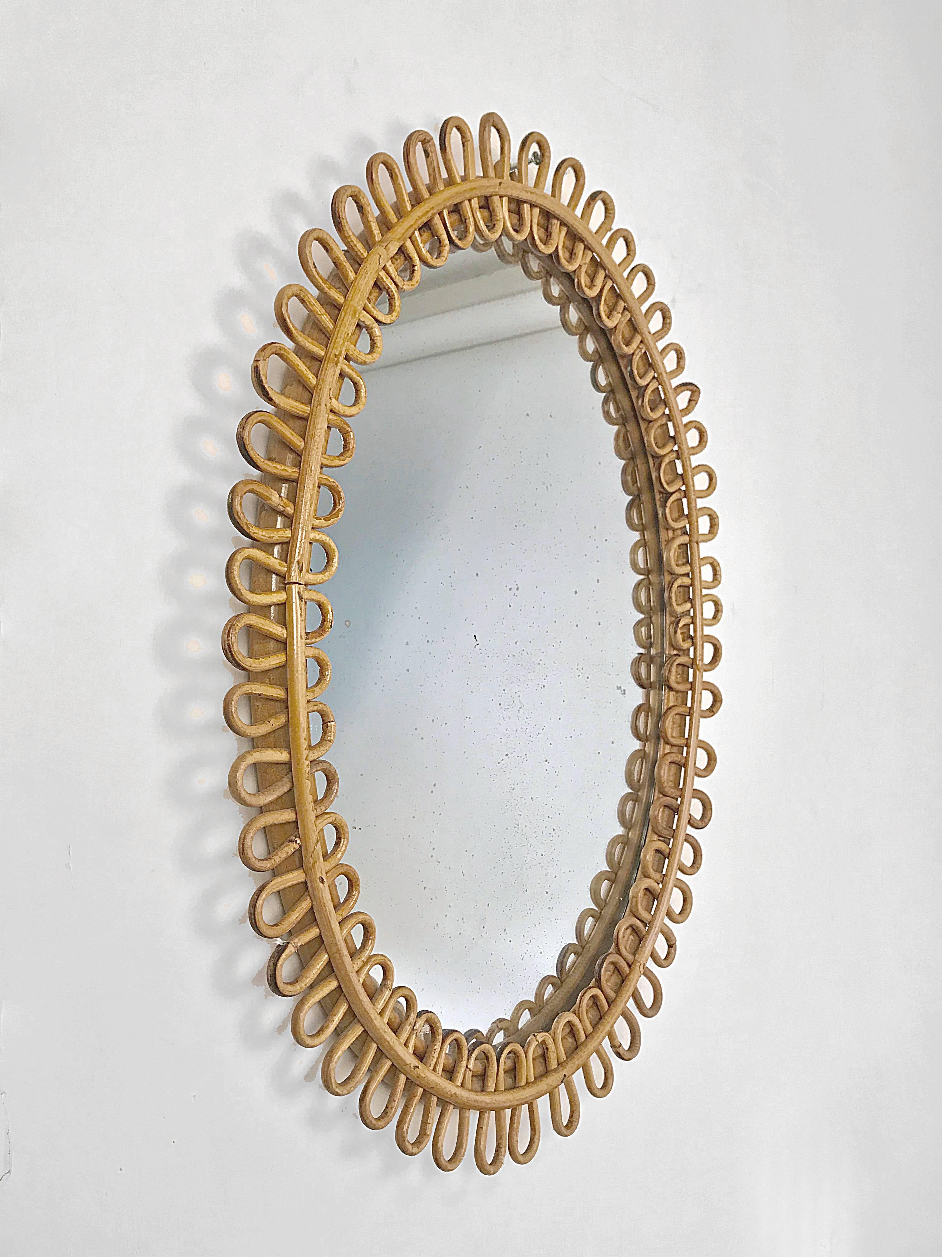 French Riviera oval wall mirror in bamboo and rattan, 1960s Mid-Century
Cm 58x44
