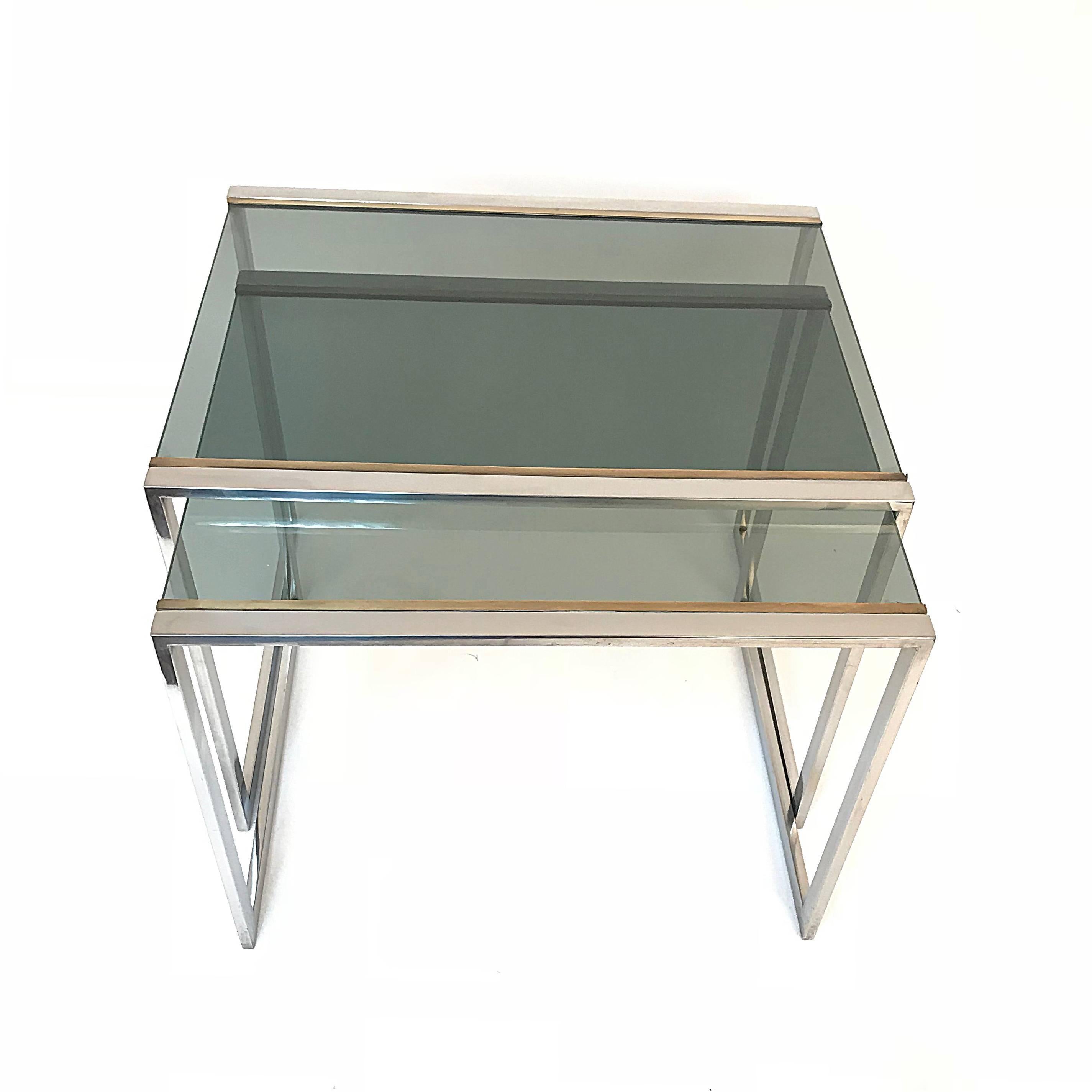 Late 20th Century Nest of tables in metal and brass smoked glass: France 1970s 