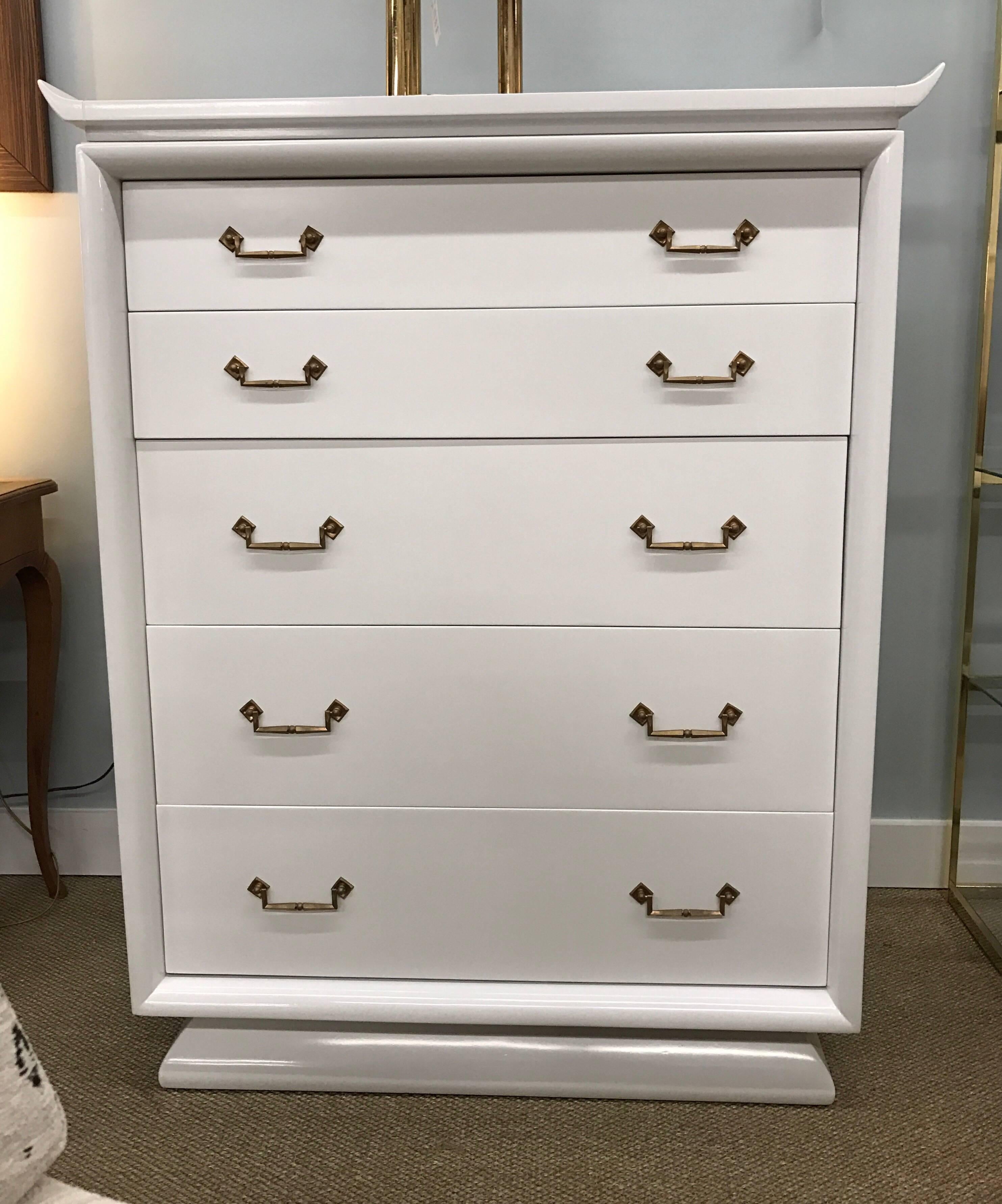 White lacquered tall chest with five drawers and original brass hardware.