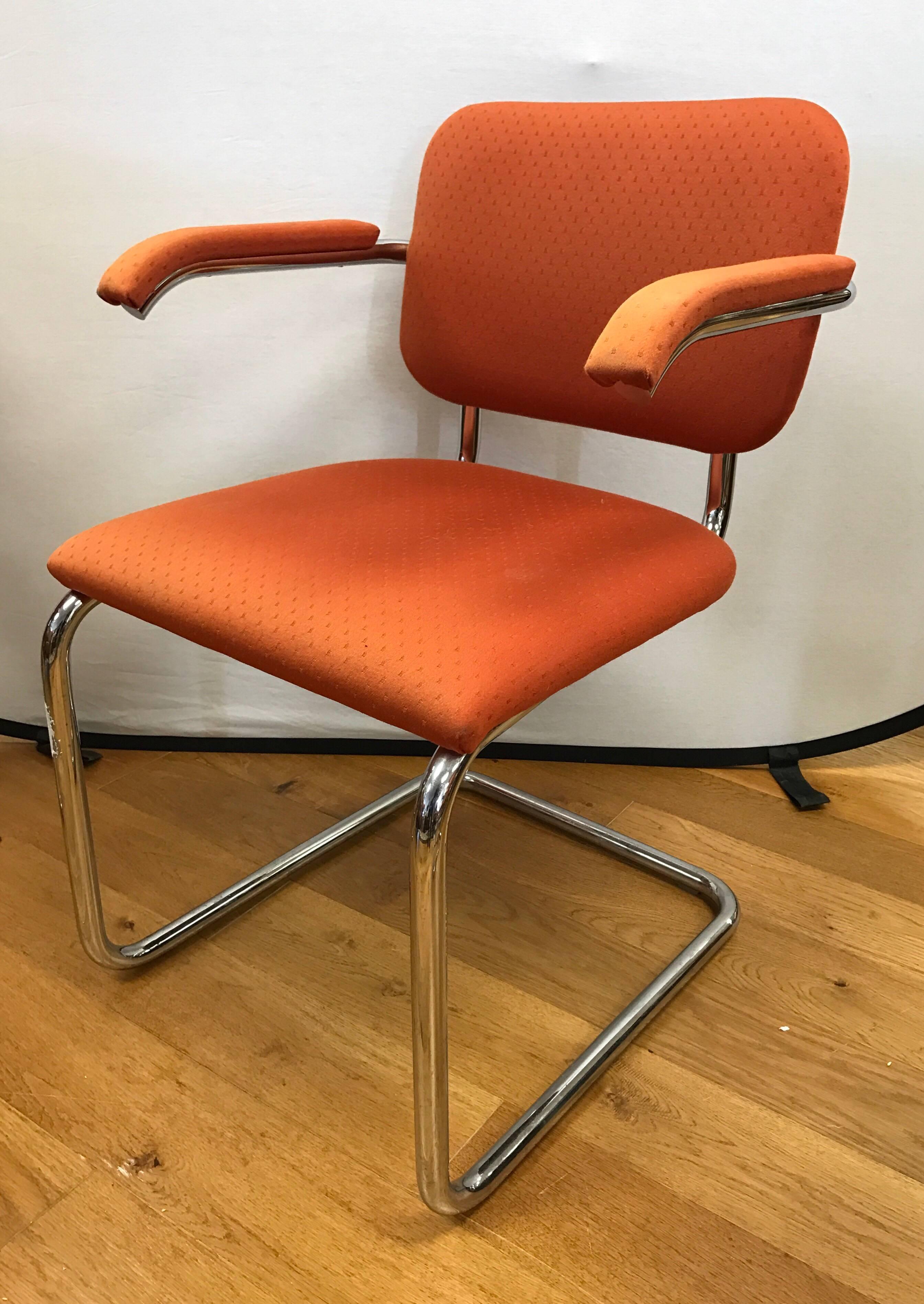 Set of three armchairs by Knoll featuring sleekly designed chrome cantilever frames. Two of the chairs need cleaning or reupholstering.