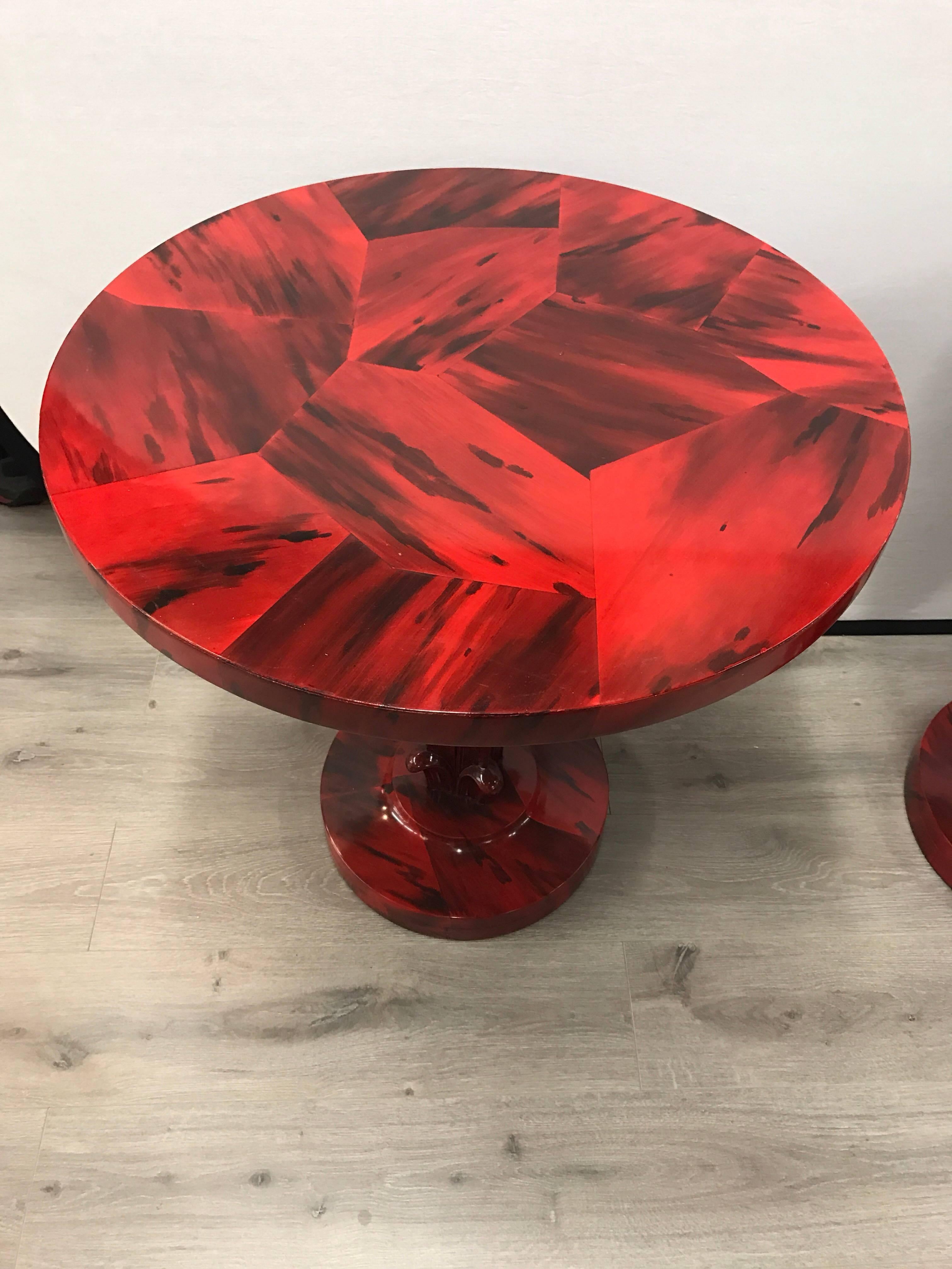Stunning pair of Art Deco palm tree round tables in a unique red and black lacquer. Attributed to Serge Roche.
