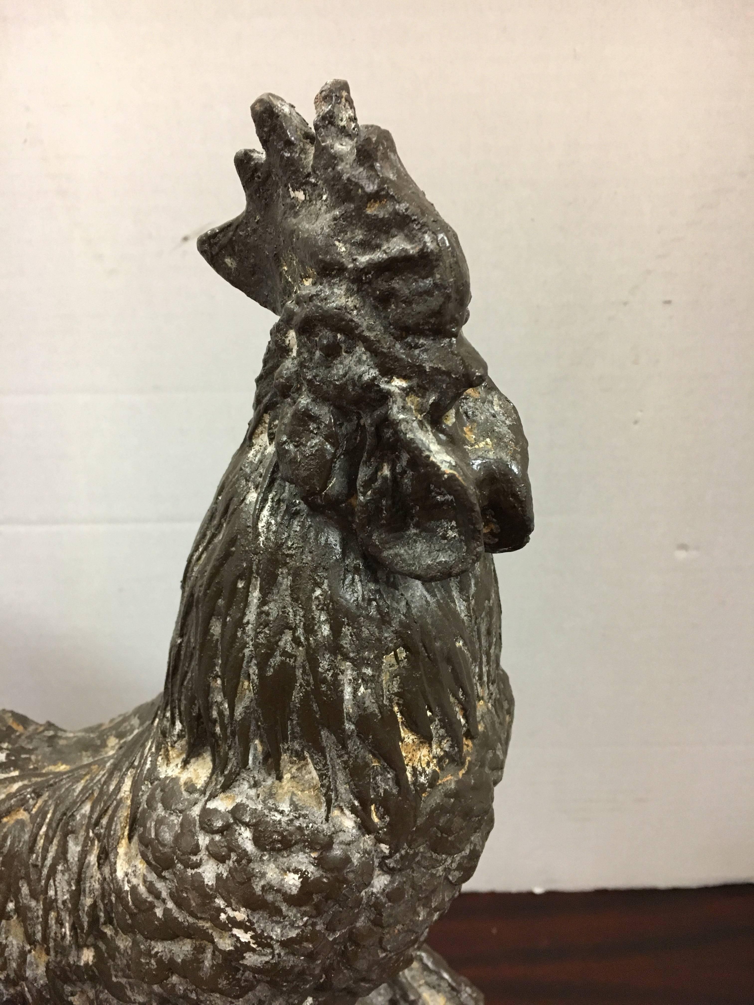 Monumental late 19th century large cast iron rooster with intricate detailing throughout.  