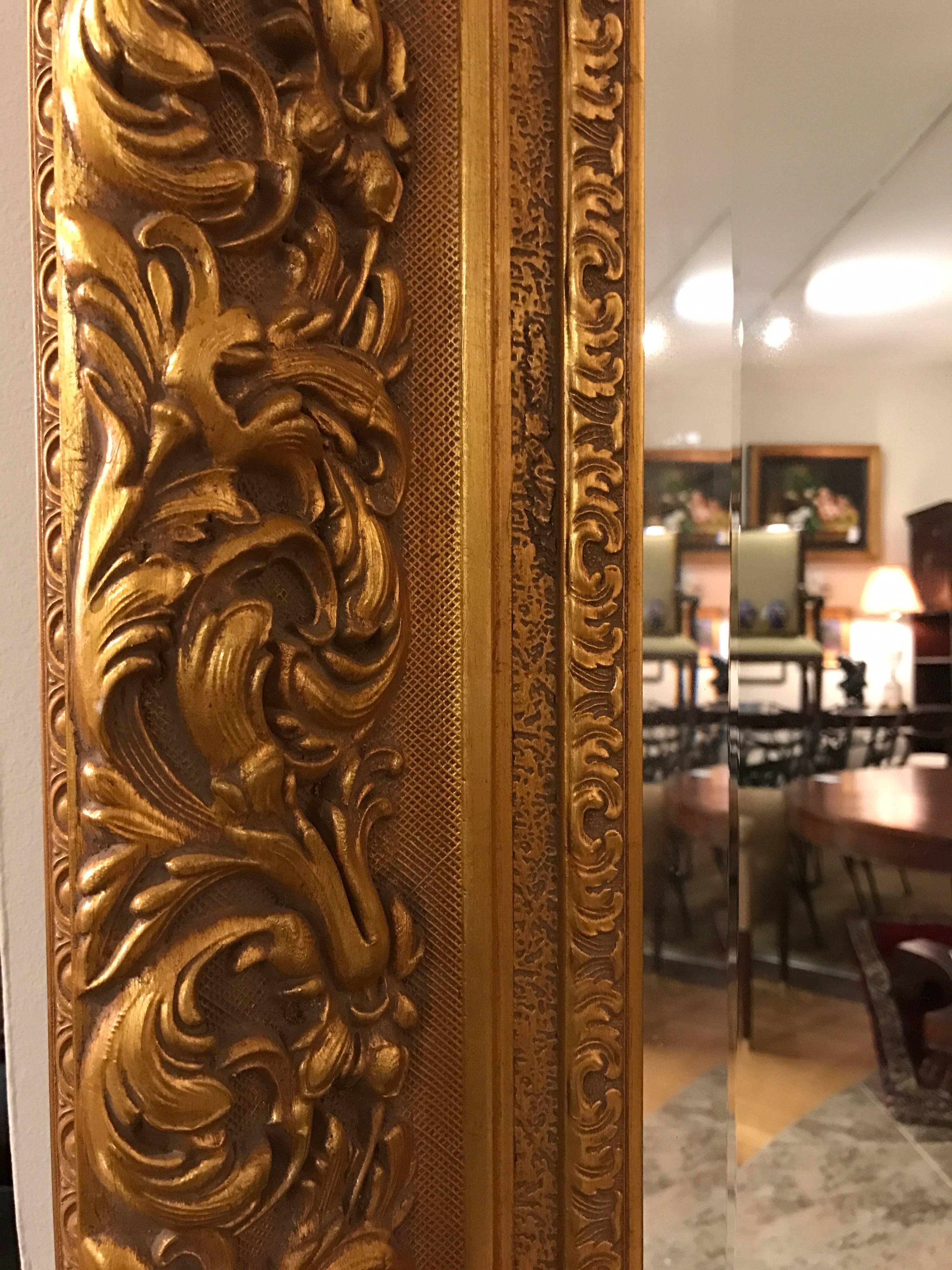 Stunning La Barge gilt wood carved full length floor mirror.  Mirror is beveled, carvings are ultra ornate and condition is mint!