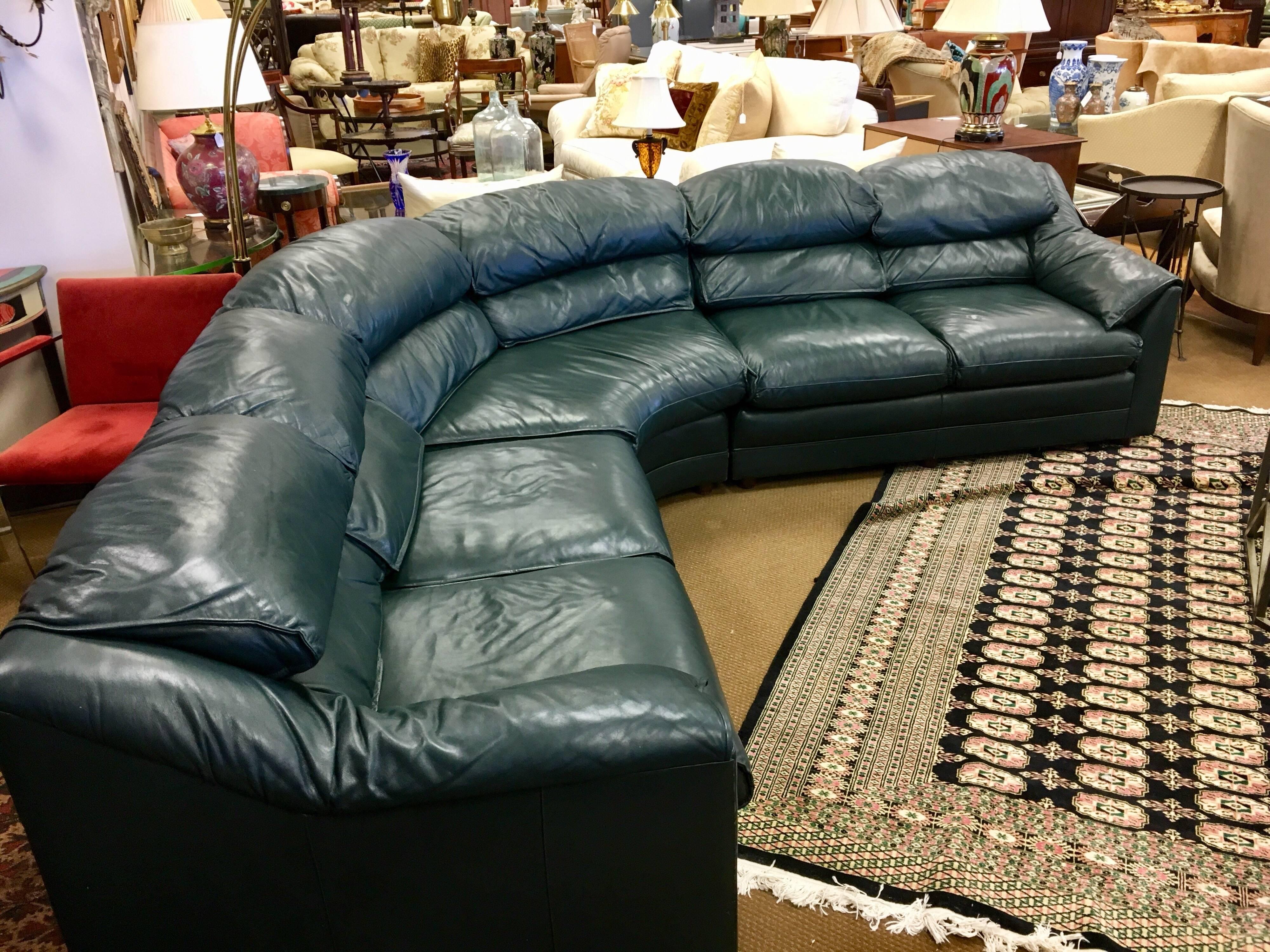 Large three piece Hancock & Moore 100% leather sofa.
Color is British Racing Green - see pics.
Dimensions are left, center and right with the center piece being curved have widths as follows, 54