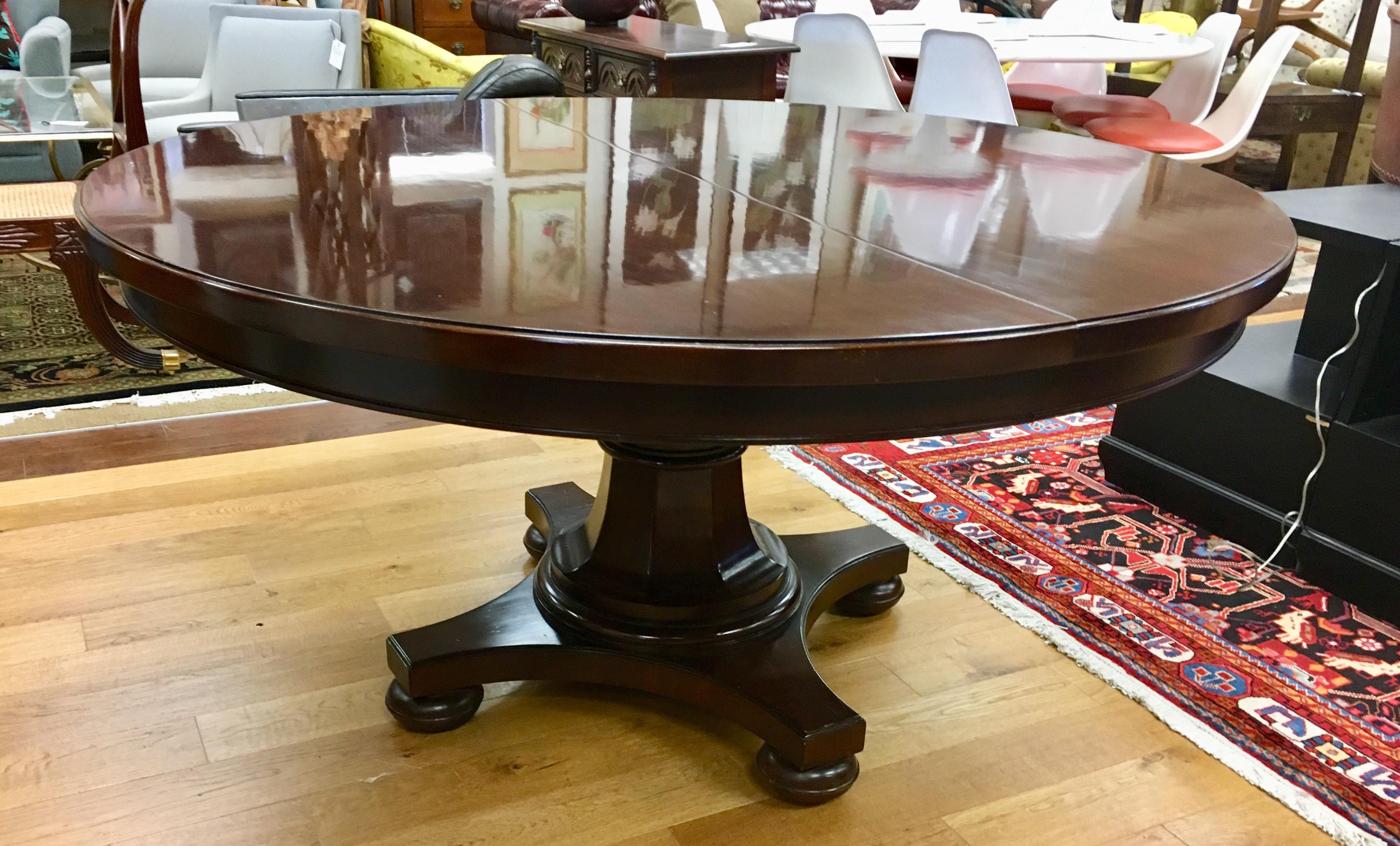 round mahogany dining table with leaves