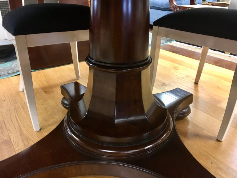 Round Mahogany Dining Room Table with Expandable Leaf at 1stDibs