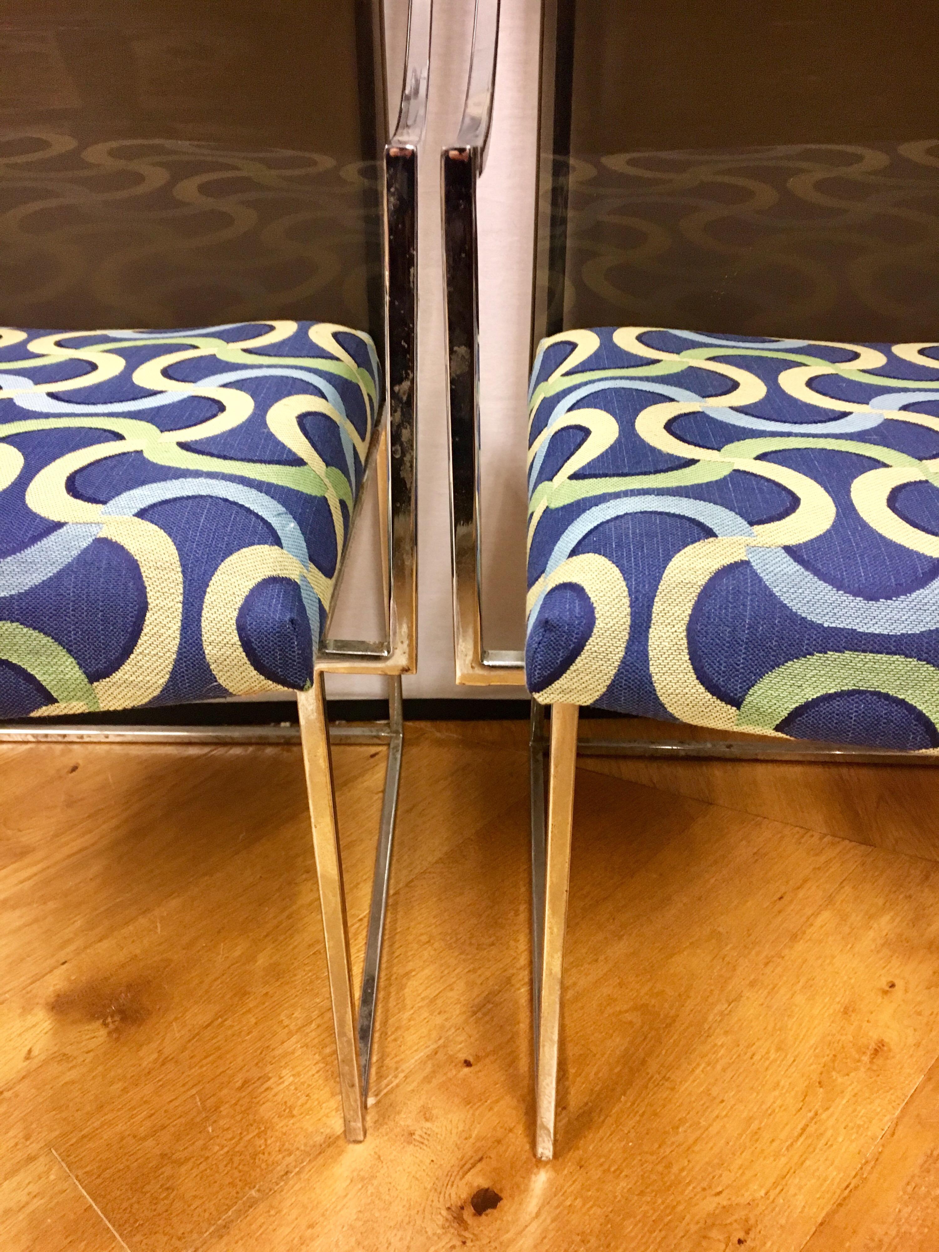Pair of chrome and lucite Milo Baughman arm chairs with new Knoll fabric on seat.