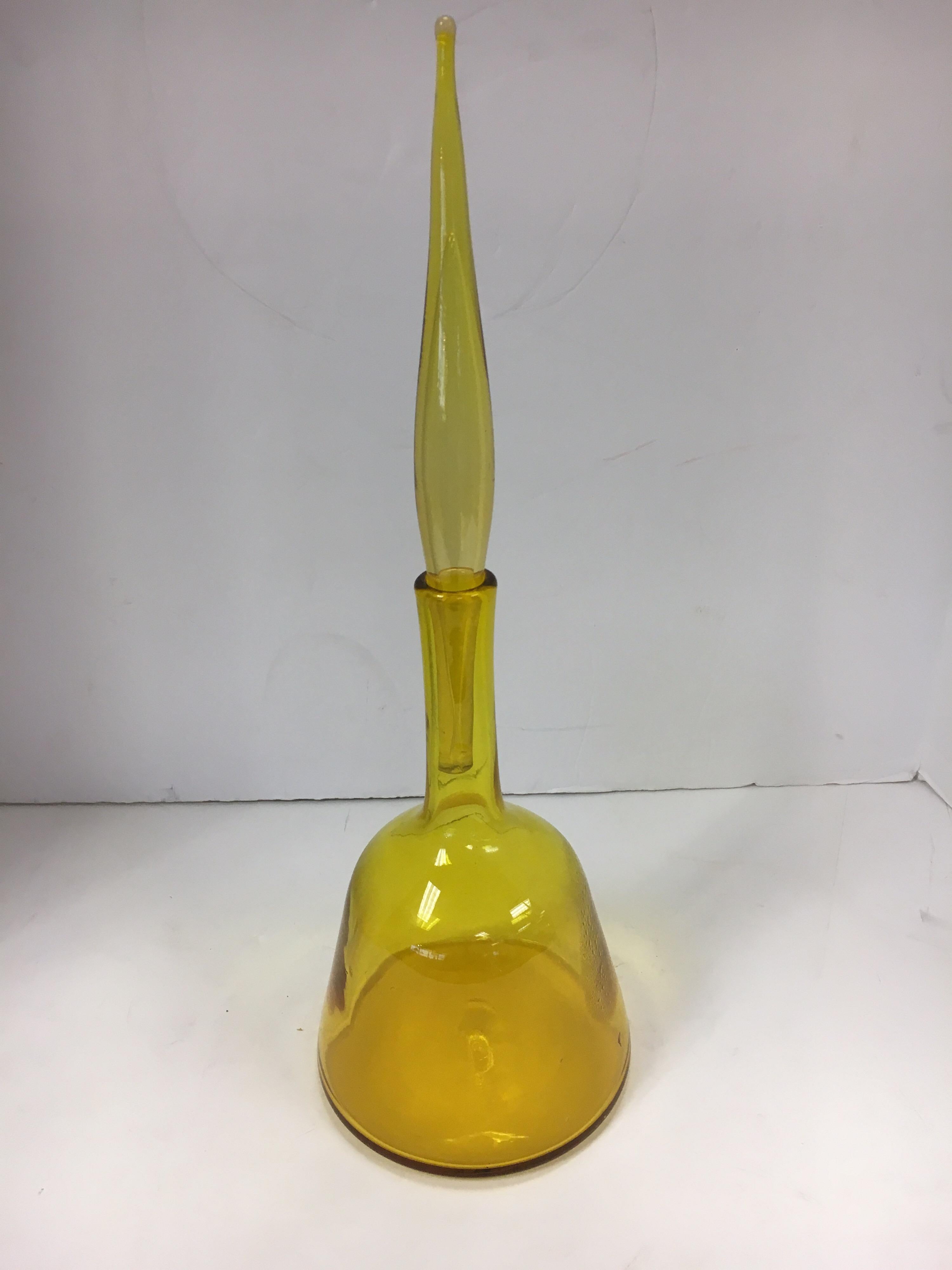 Beautiful yellow colored Blenko glass decanter with tall matching stopper. Great addition to your Blenko collection.