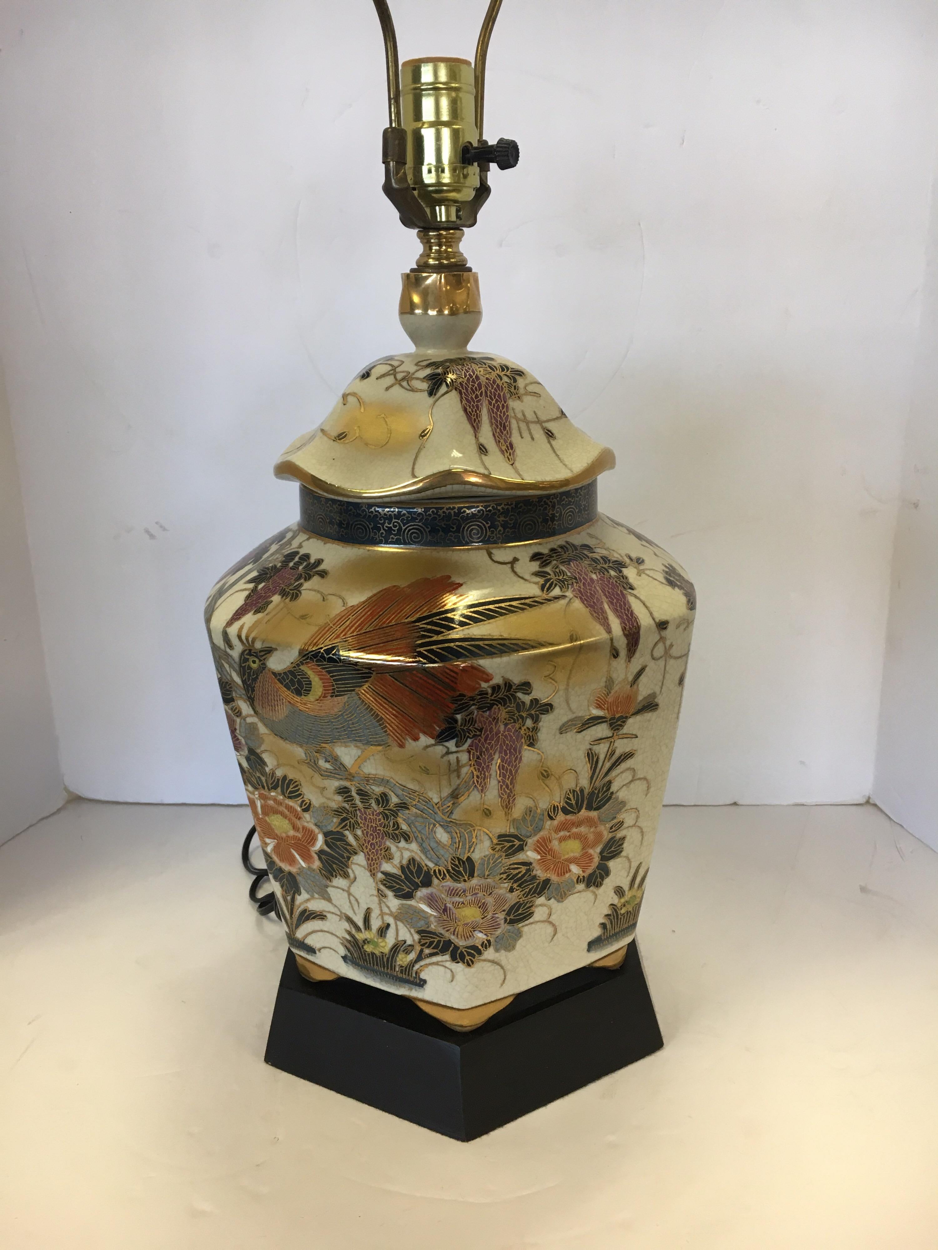 Gorgeous Asian inspired table lamp with vibrant colors throughout. Wired for USA and in perfect condition.