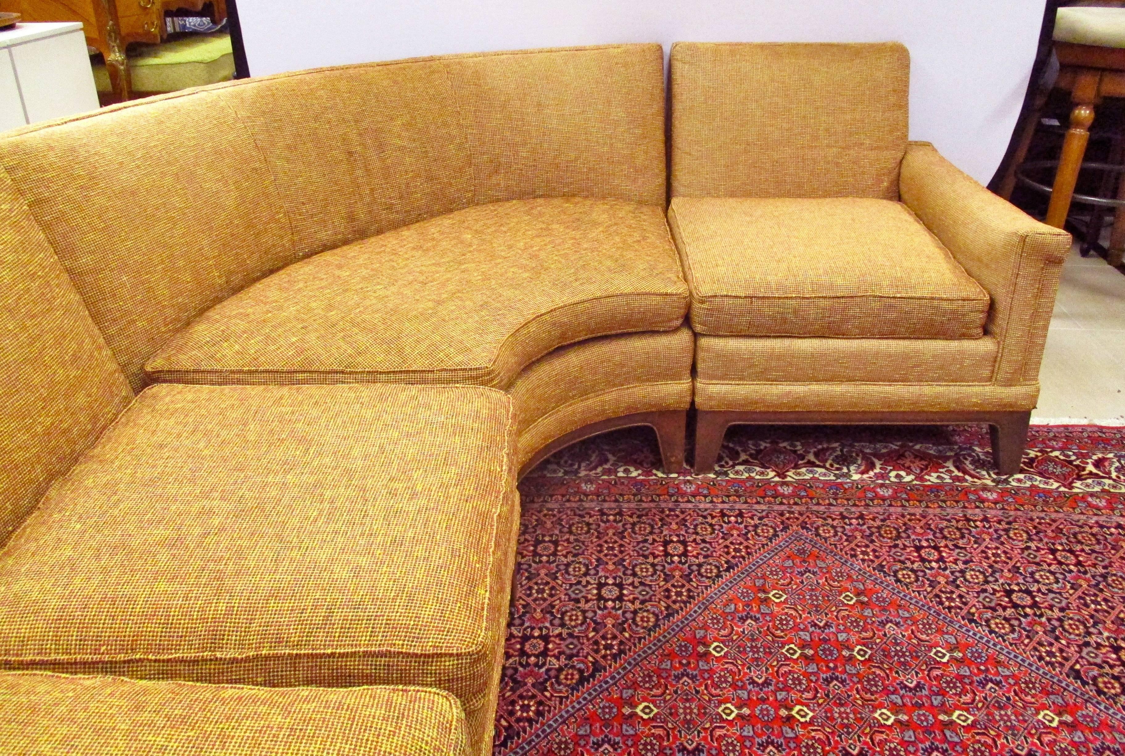 Vintage mid century six-piece sectional sofa with great style and craftsmanship. It consists of two arm (left and right) sections, one curved section and four armless sections.
Curved section 48 inches wide x 48 inches deep x 29 inches high
Three