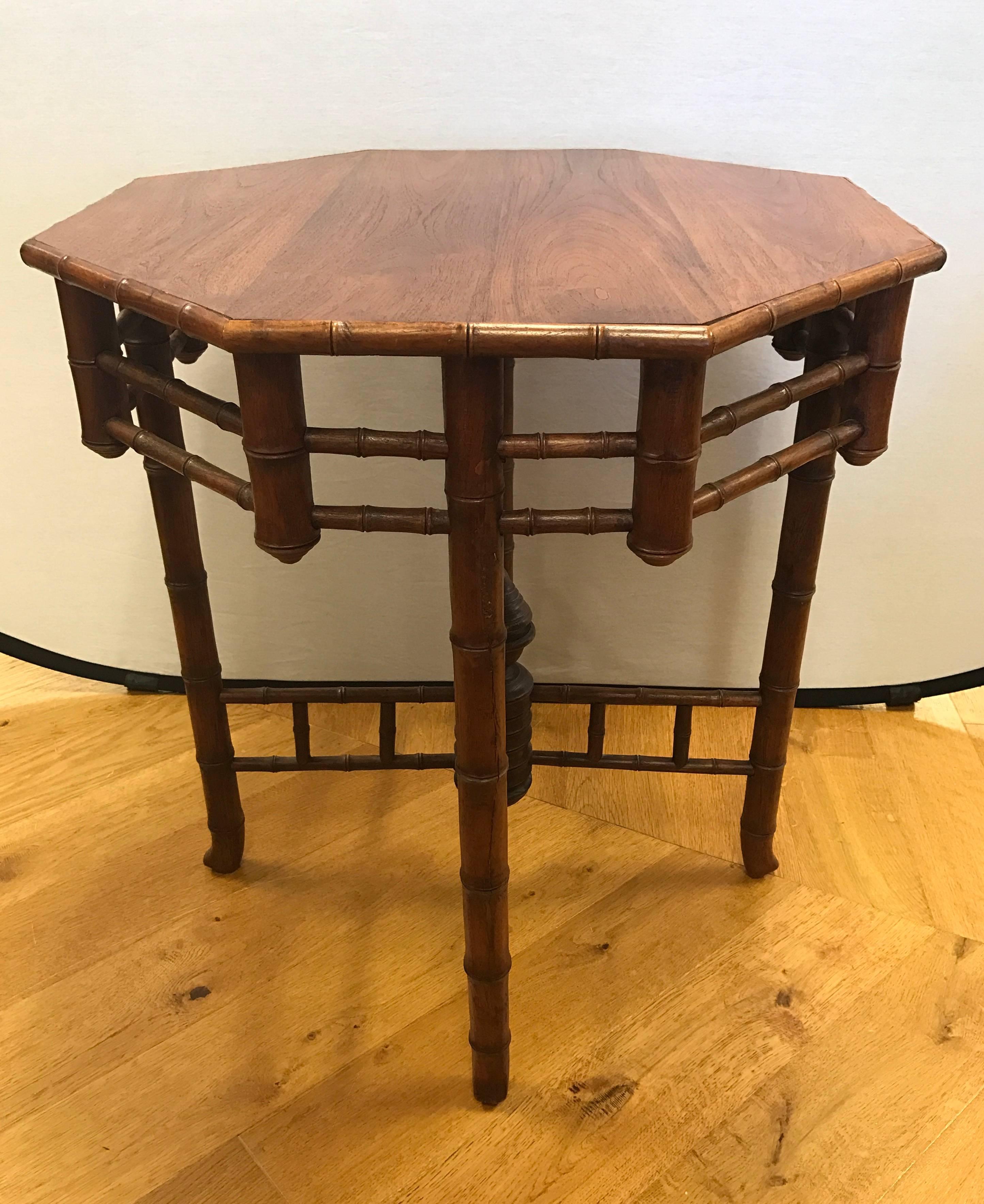 Faux carved bamboo hexagonal table that works in a foyer, living room, bedroom or library.