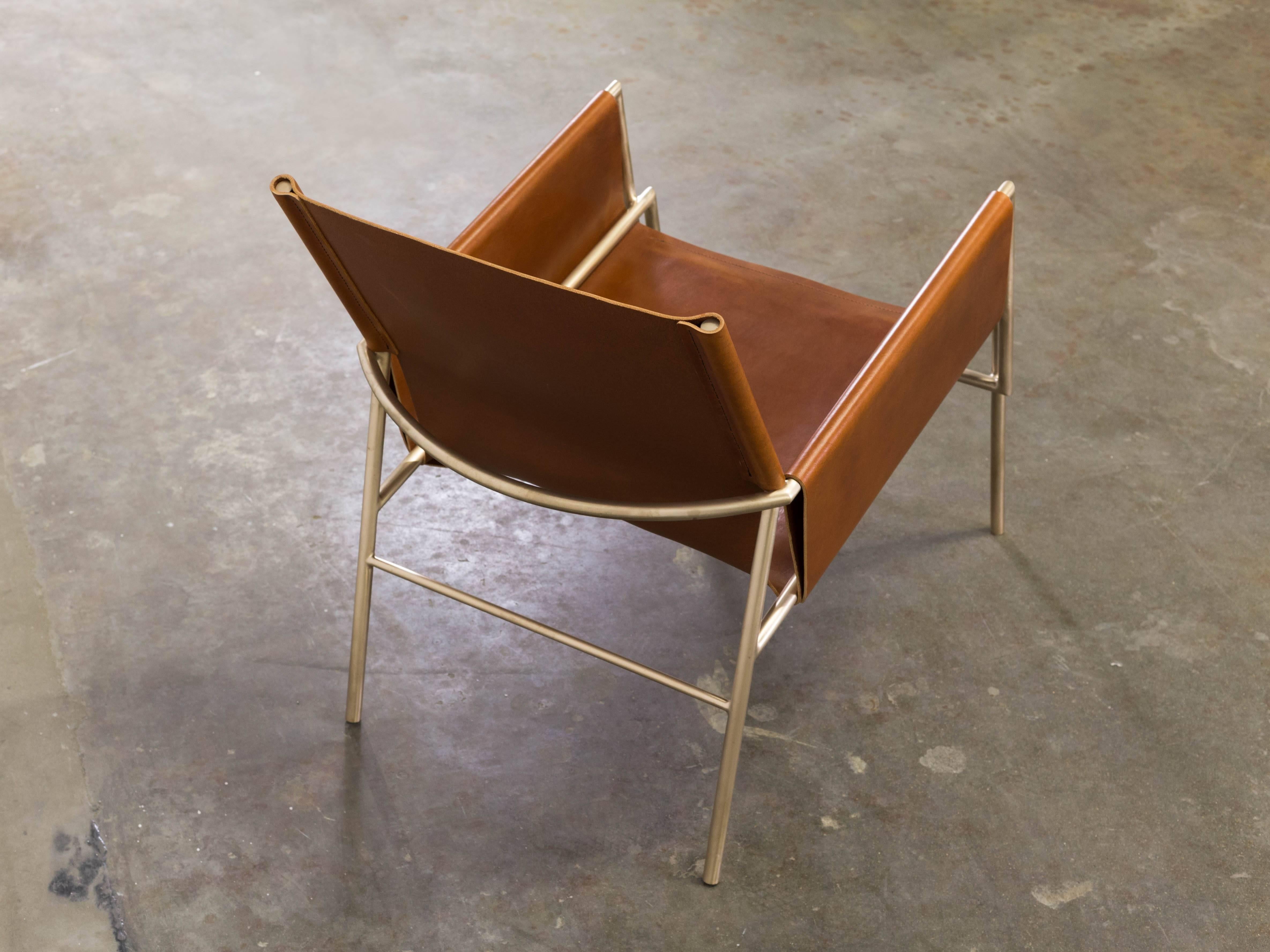The Lincoln lounge chair consists of a metal frame and a single full grain leather hide, tensioned with adjustable cord lacing underneath the seat. The frame is finished to a fine even polish, with all connections blended and obscured. 

Shown in