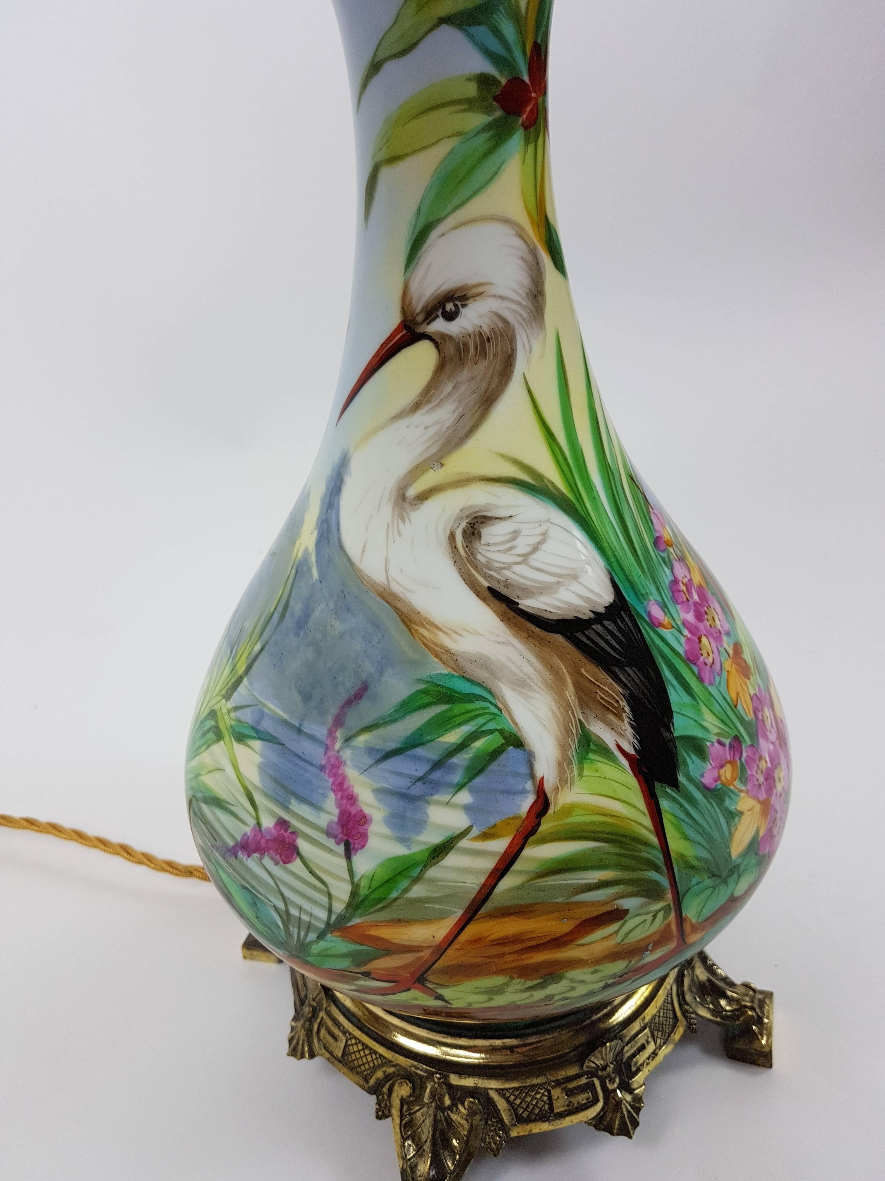 English Porcelain Table Lamp Depicting a Heron and Verdant Foliage For Sale