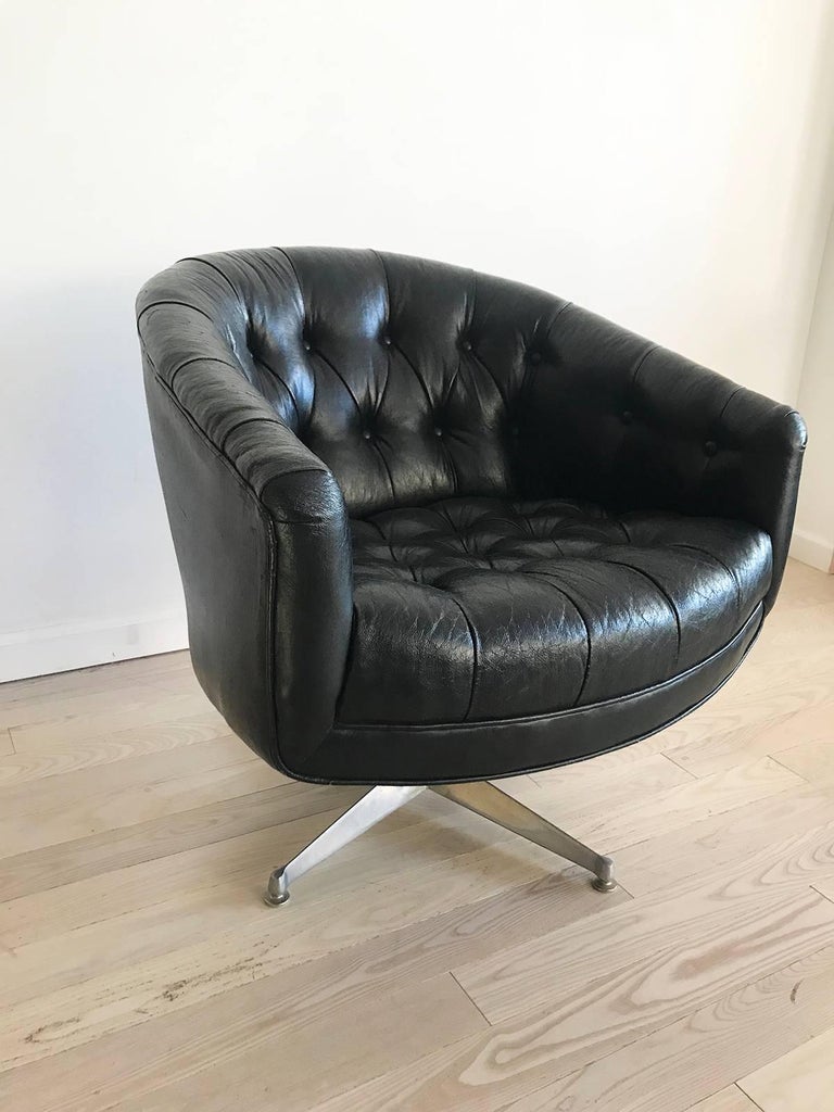 Ward Tufted Black Leather Swivel Club Chair at 1stdibs