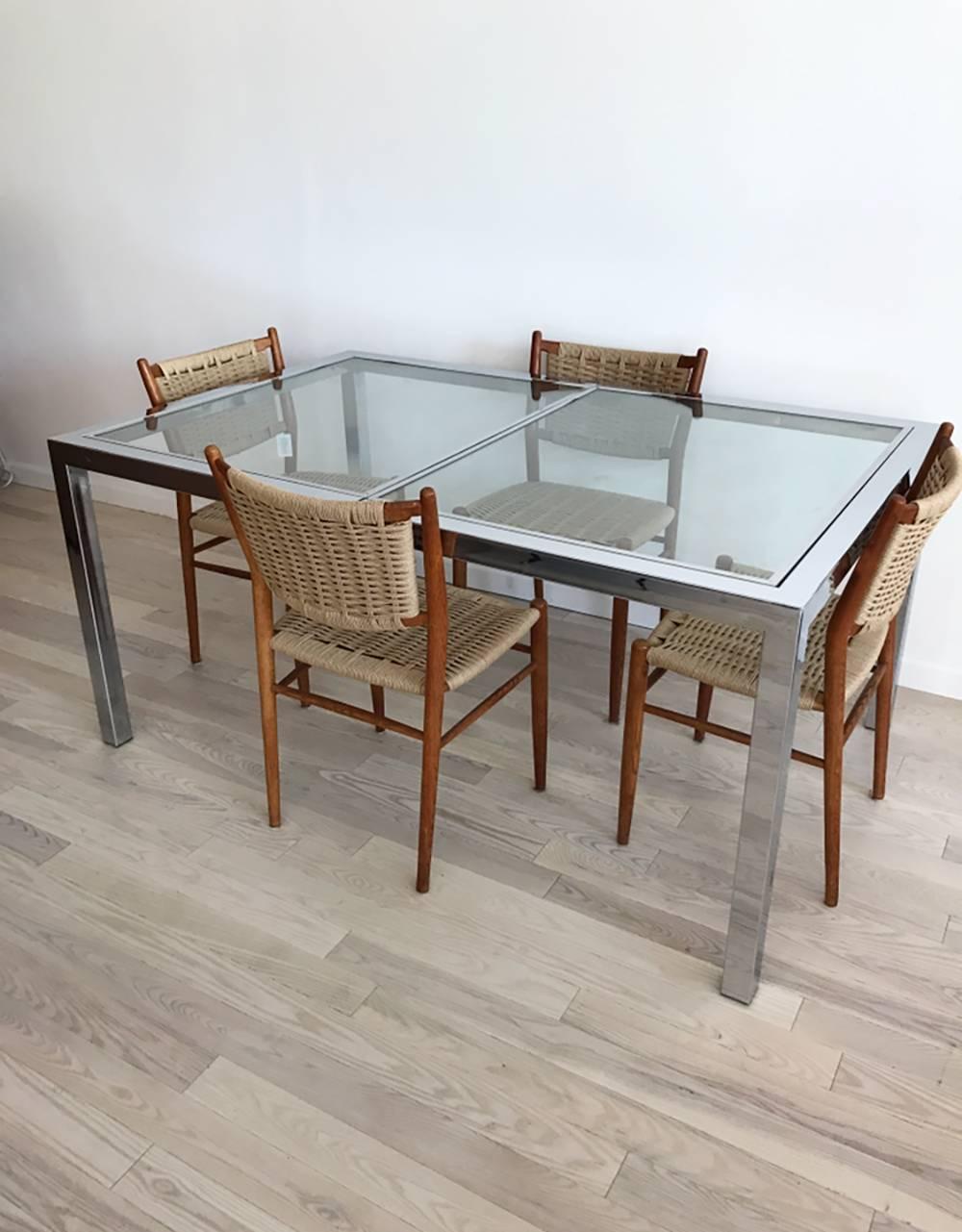 Set of four super rare dining chairs. Midcentury fumed oak Scandinavia dining chair. Designed by Bendt Winge imported by IDG from Norway. Brand new woven Danish cord rope seats and back, the wood frame is from 1958. Simply beautiful, and timeless