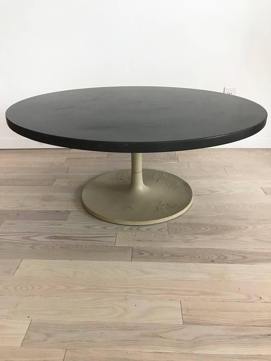 1968 thick slate top Jens Risom circle tulip coffee table. Very rare to see this table in a slate top! Pretty contrast with the slate top and cream colored base. The base has some rust and chips from age.