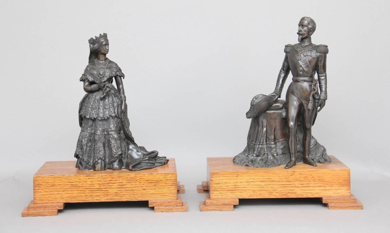 A pair of French 19th century bronzes of Napoleon the third (1808–1873) the last of emperor of France (1852–1870) and his consort the empress Eugenie. The bronzes were most probably cast for the great exhibition of 1855 in Paris, and their oak