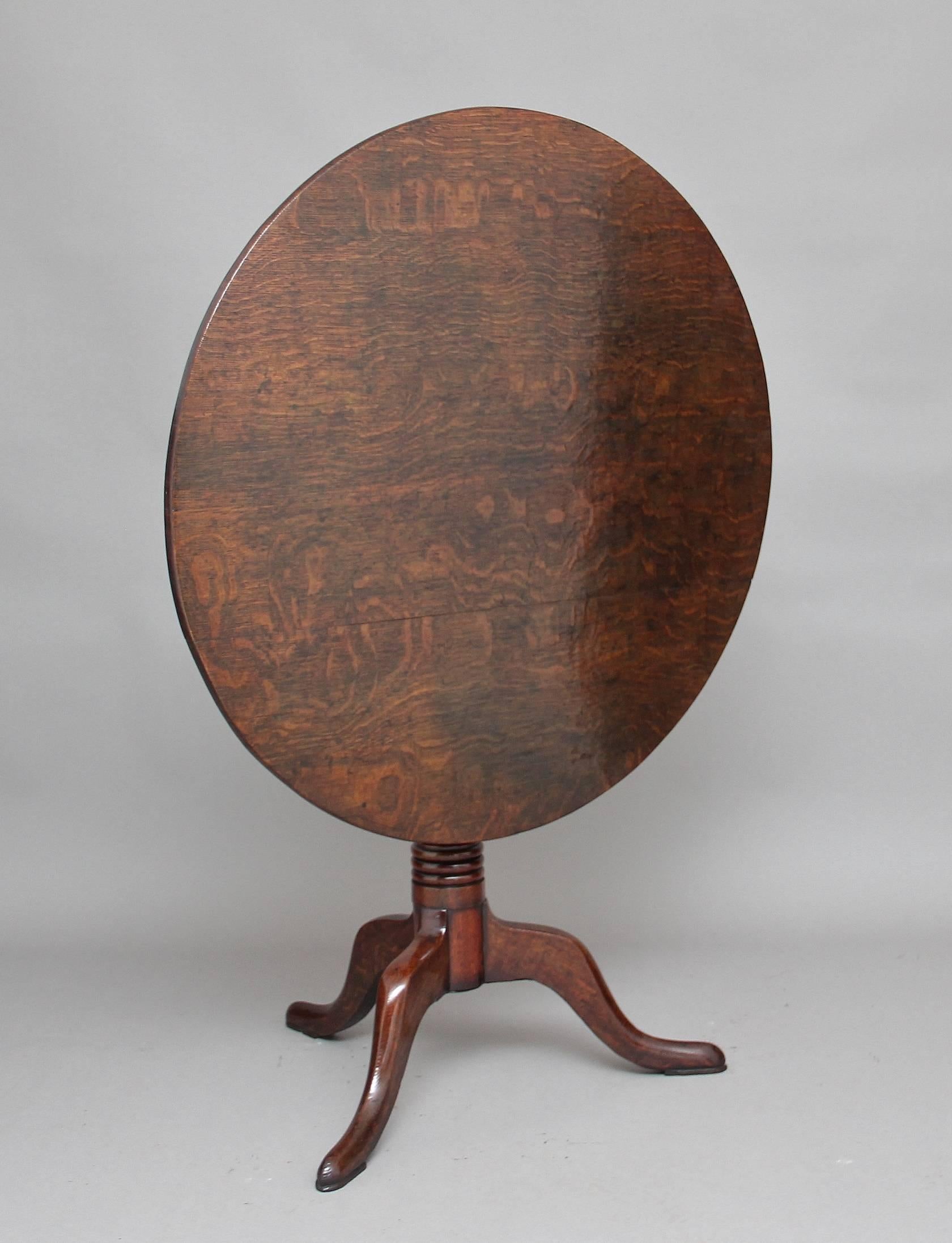 18th century oak tripod table, the circular tilt-top supported on a lovely turned column with three slender cabriole legs. Lovely patina. circa 1790.