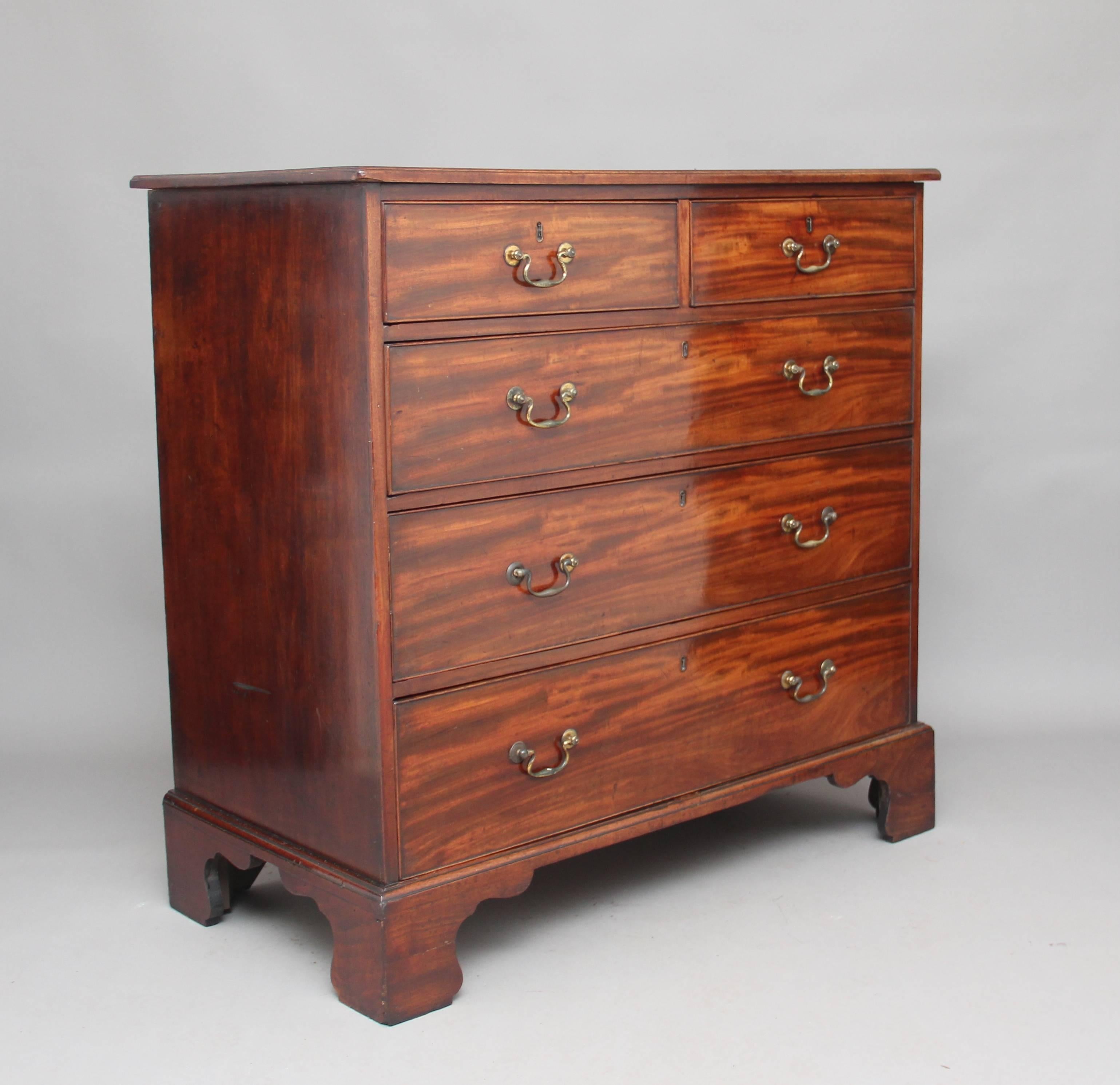 A superb quality 18th century mahogany chest of drawers of good proportions, the moulded edge top above two short over three long drawers, all oak lined with original brass swan neck handles, standing on bracket feet, a lovely piece and having a