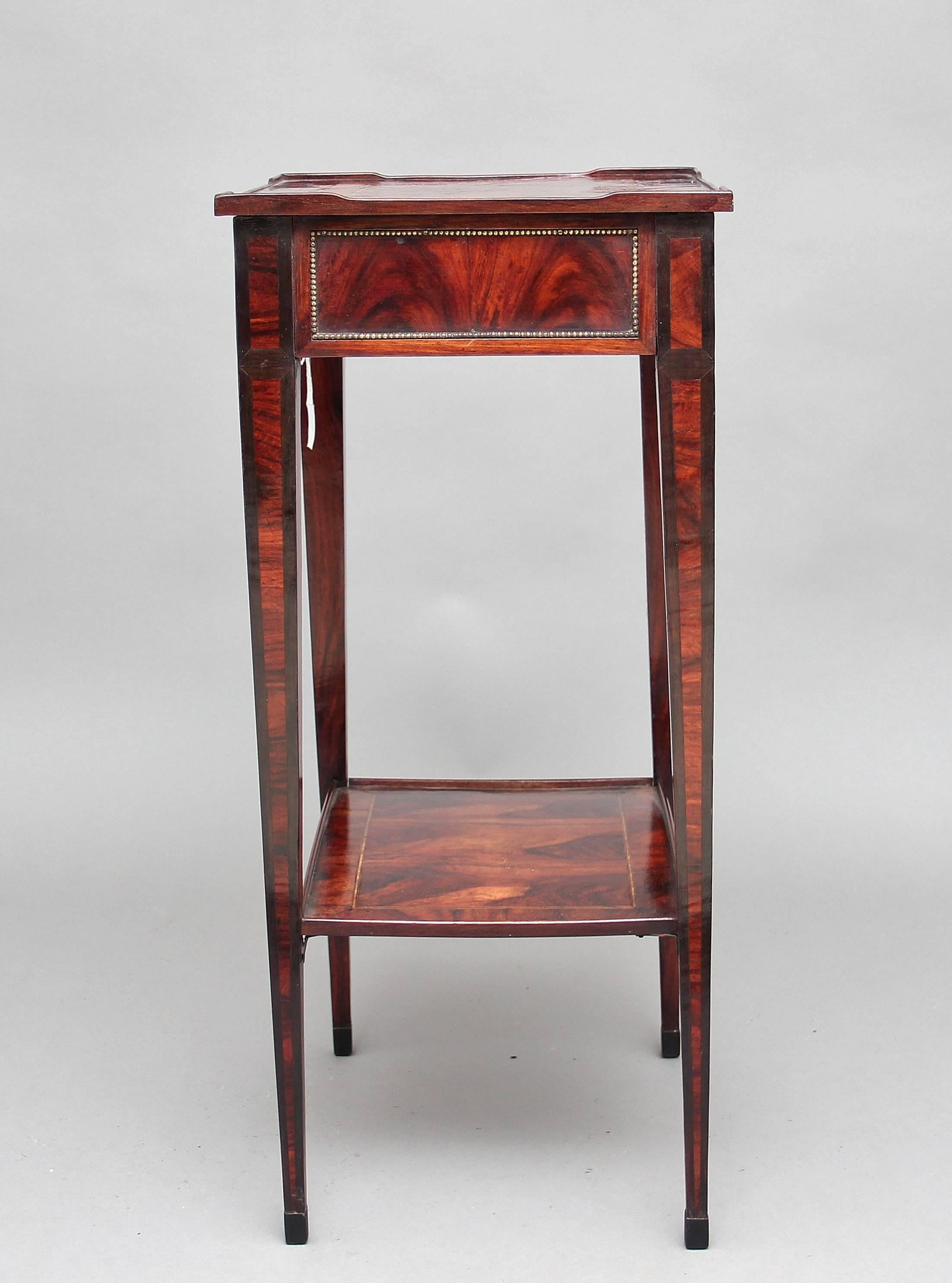 An unusual and rare 19th century continental specimen wood occasional / side table, the top inlaid with swags with a raised shaped gallery, below the frieze panels decorated with brass beading along the front, sides and back, with square tapering