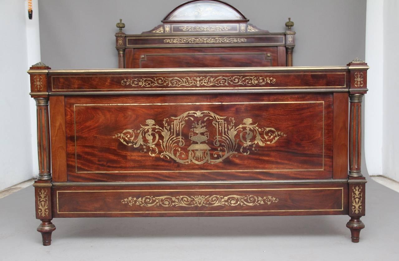 Exhibition quality 19th century mahogany and brass inlaid French bed, the color of the of the mahogany and the quality of the brass is truly fabulous, the brass inlay is all engraved and the mouldings are all brass, a truly magnificent bed, circa