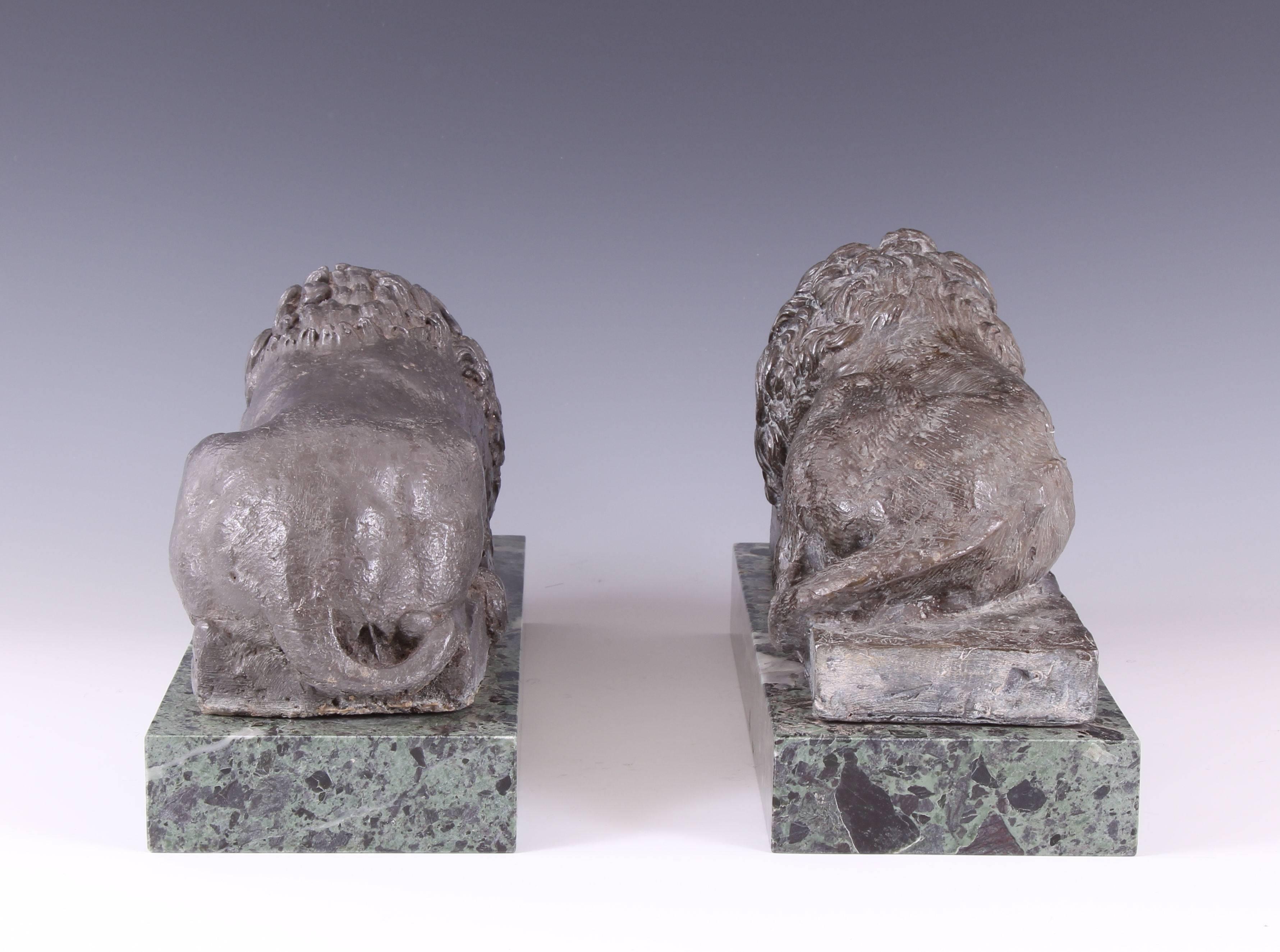 Early 19th Century Pair of 19th Century Lead Canova Lions of Marble Plinths