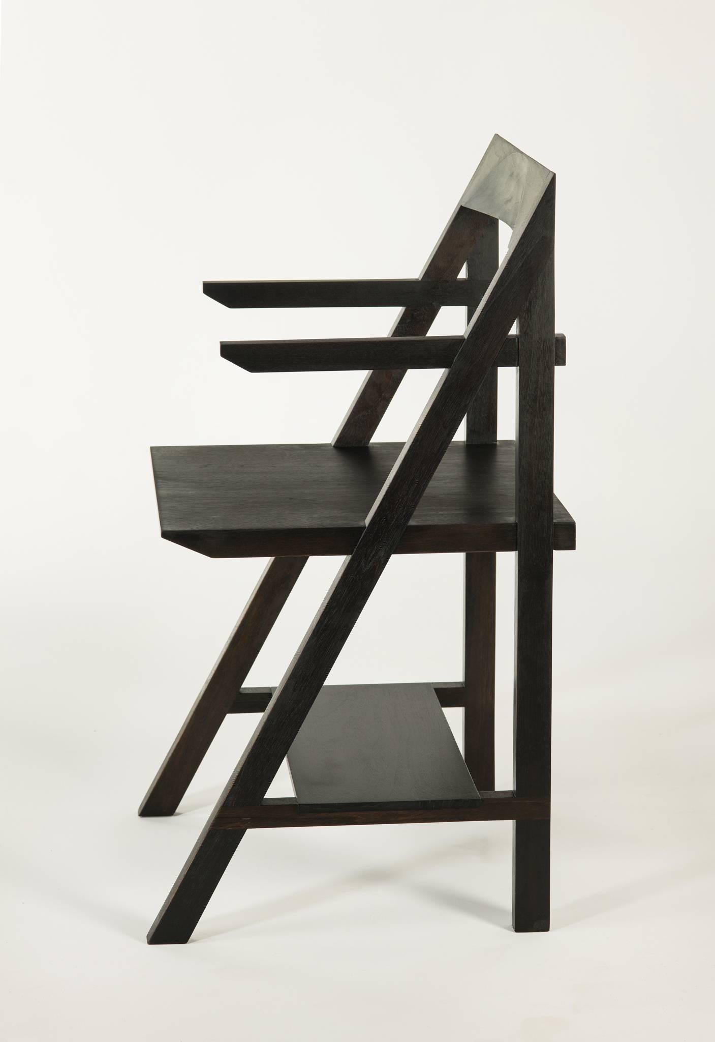 The Cantilever armchair is inspired by Classic Bauhaus design.

The Cantilever armchair is a simplified form that blends rationality with functionality.

Originally envisioned as an entryway piece, the shelf below provides a practical means of