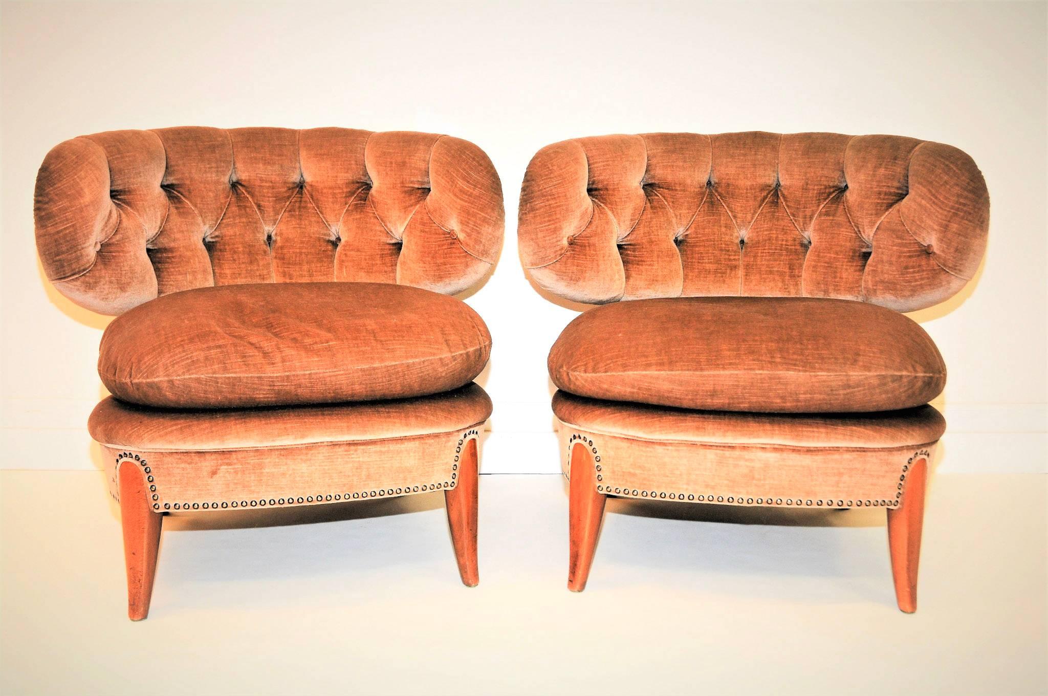 This pair of chairs by Otto Schulz for the Boet in Gothenburg, Sweden was one of the best sellers in the 1940s. With its generous seat and back, and not least the soft cushion, it invites you to a comfortable sitting. Color of beige/brown velvet.