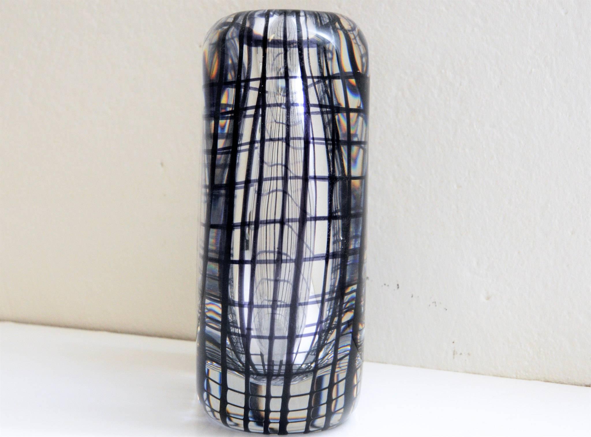 Vintage Square shaped vase by Hermann Bongard (1921–1998). Hadeland Glassverk, middle of the 1950`s, Norway. This midcentury Art glass of Hermann Bongard is well known for it`s stylish purple lines. Measures: 13 cmH. 11 cmW, 4,5 cmD. Good vintage