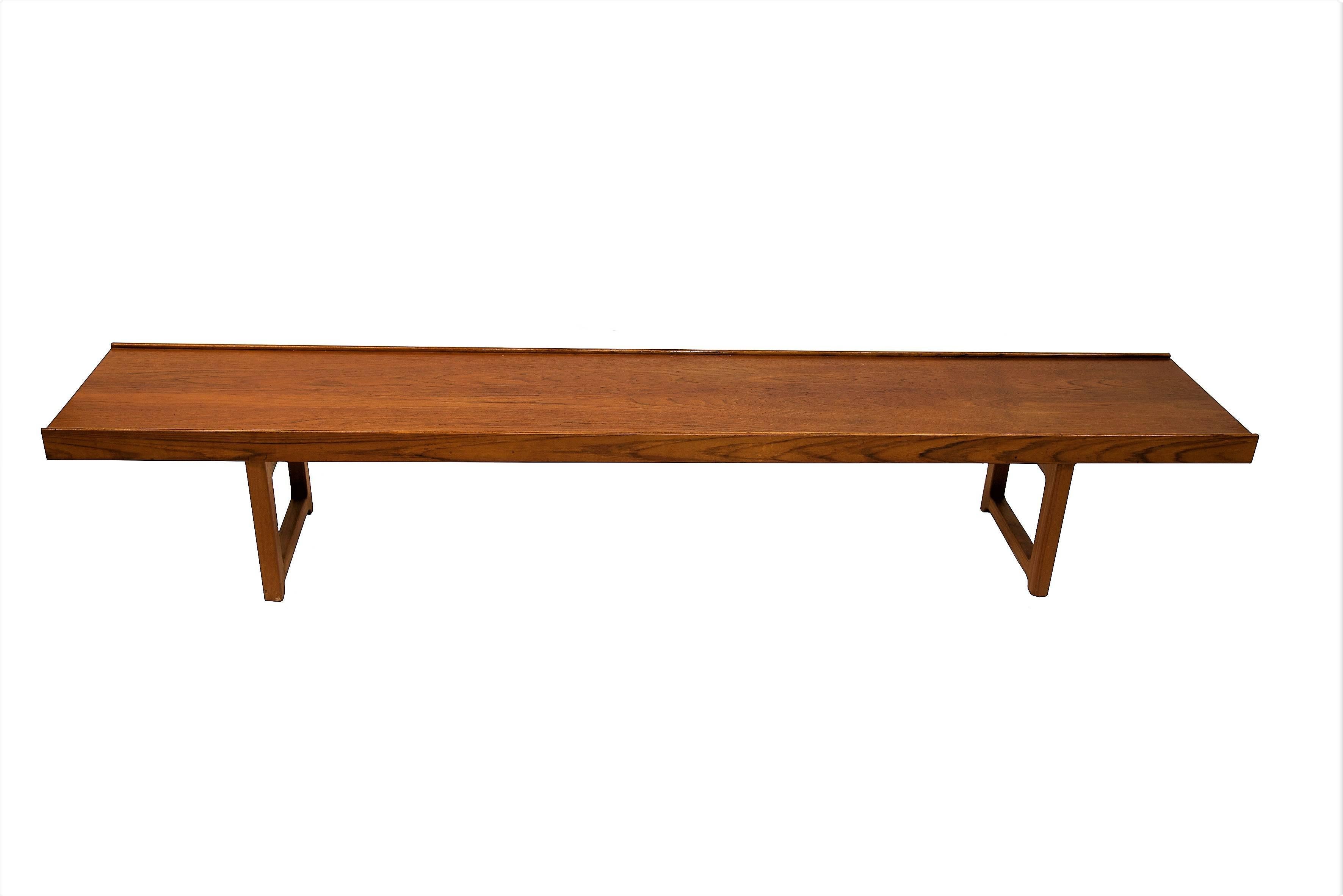 This Krobo bench in teak by Torbjørn Afdal was produced circa 1960s. Torbjørn Afdal was one of the leading designers at Bruksbo Tegnekontorer and in Scandinavia. Flower case to be bought separately if preferred.

Torbjørn Afdal's furniture was