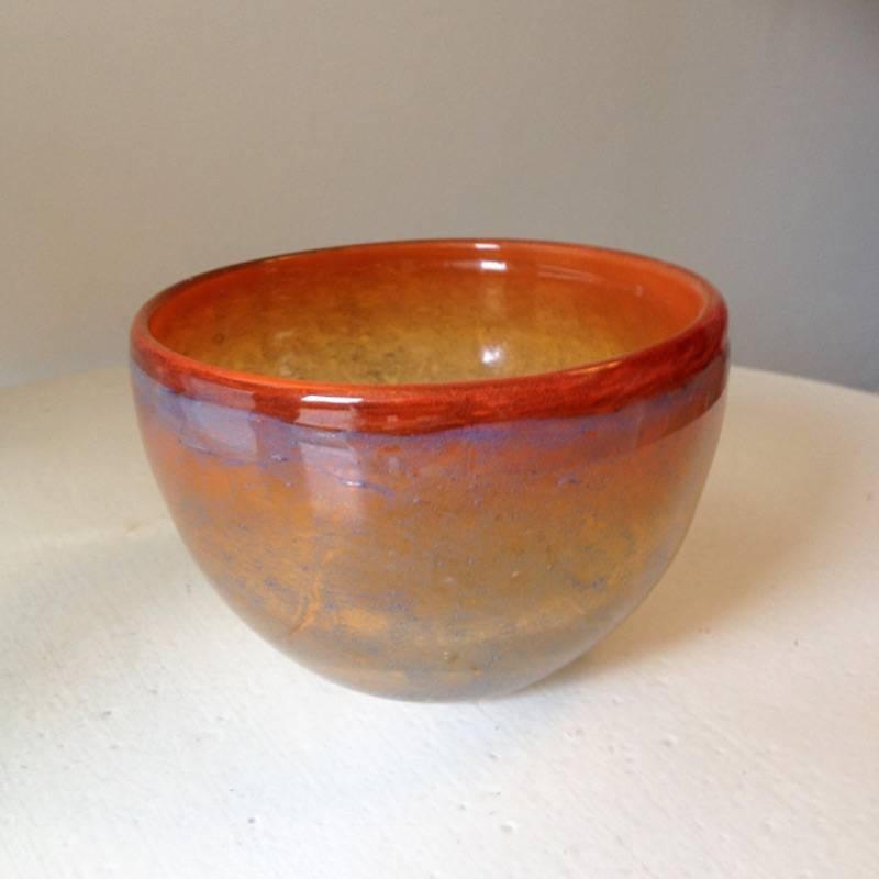 Orange glass bowl by Benny Motzfeldt, from Randsfjord Norway. Measures: height 11 cm. diameter: 16 cm. Signed BM68.

Benny Anette Berg Motzfeldt (born 26 June 1909 in Åsen, died November 24, 1995 in Oslo) was a Norwegian artisan (drawing, glass,