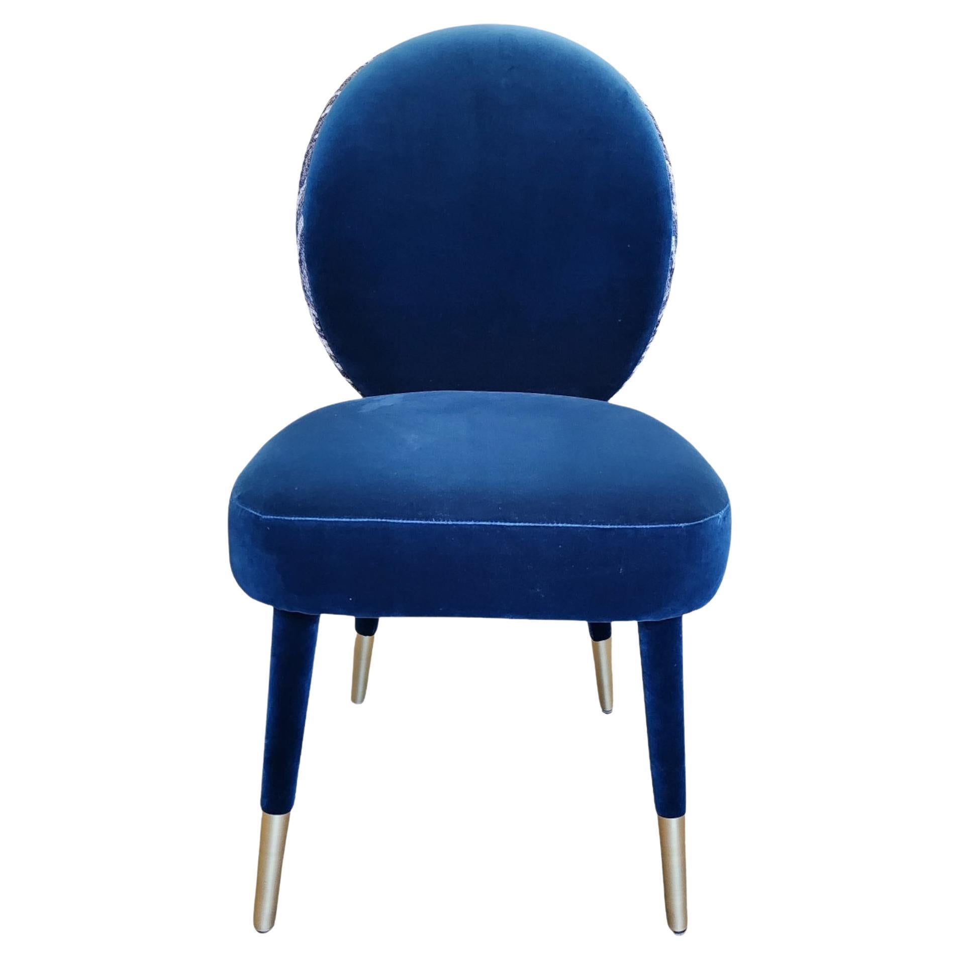 Dining chair with upholstered seat, back and legs.
Shown in Velvet.
Price is in one solid velvet.
Legs can also be made in wood stained finish.
Brass finish or chrome finish sabots, polished or brushed.
Can be customized to your specifications or