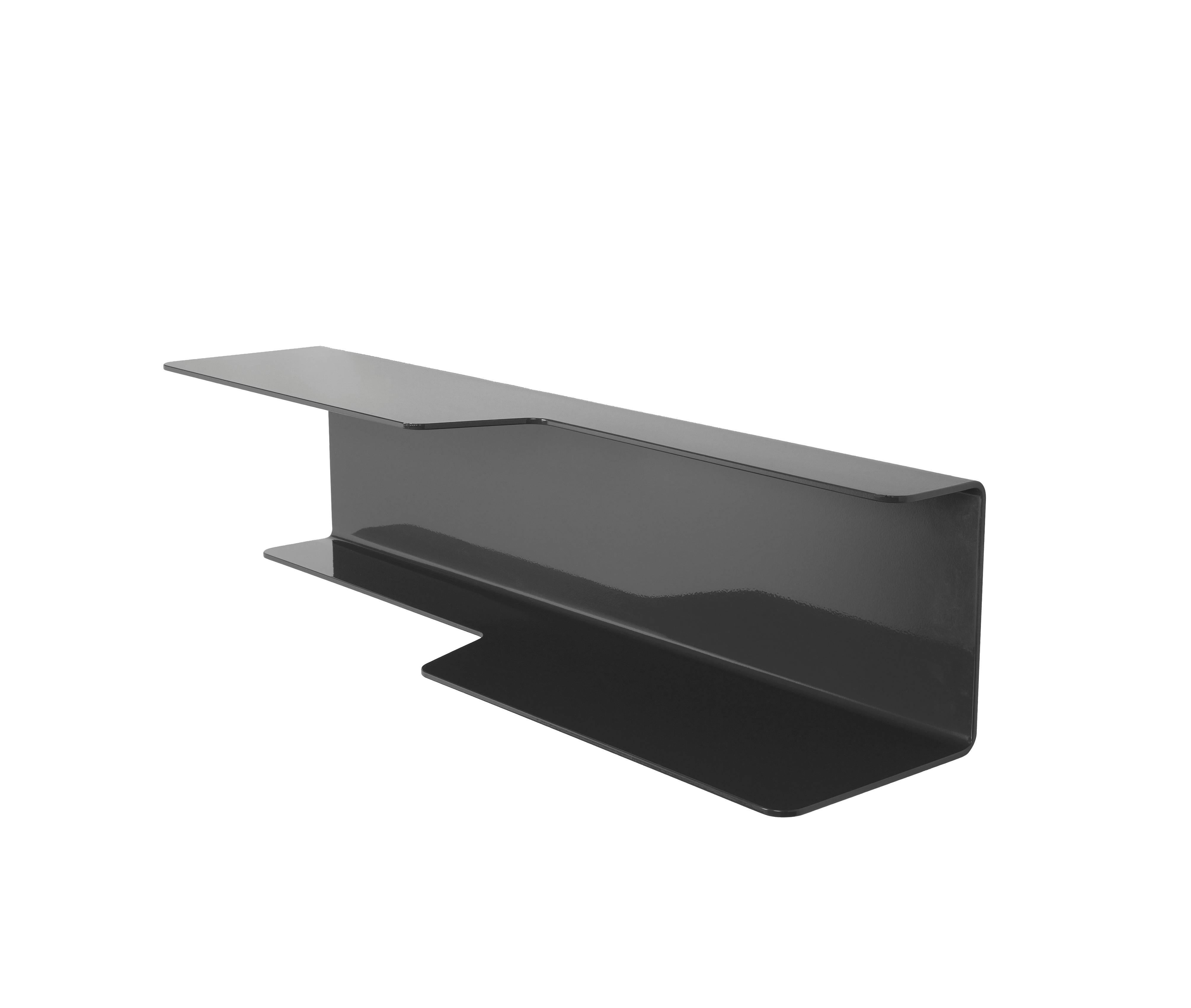 The wall-mounted, tidal shelf is formed out of 1/4 inch thick, powder-coated aluminum. Each shelf has a welded U-channel to the reverse of the shelf and easily mounts on included custom-bent steel Z-clips. The shelf is available in numerous powder