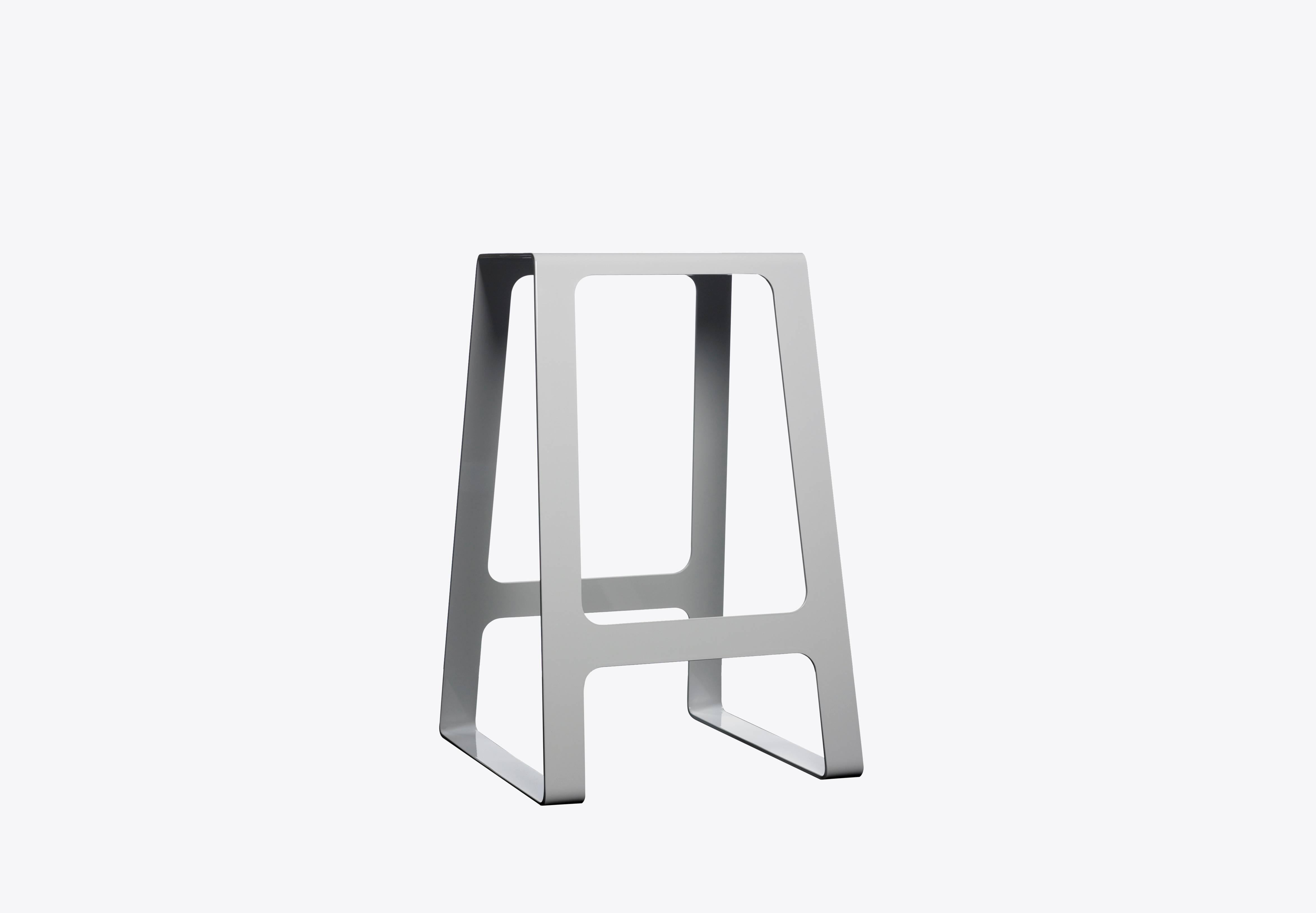 Contemporary A_Stool in counter height stool in powder-coated aluminium. A minimal, backless design in durable powder-coated aluminum. Also available in brushed, sanded, or polished finish. Signed, dated and numbered to the underside with a