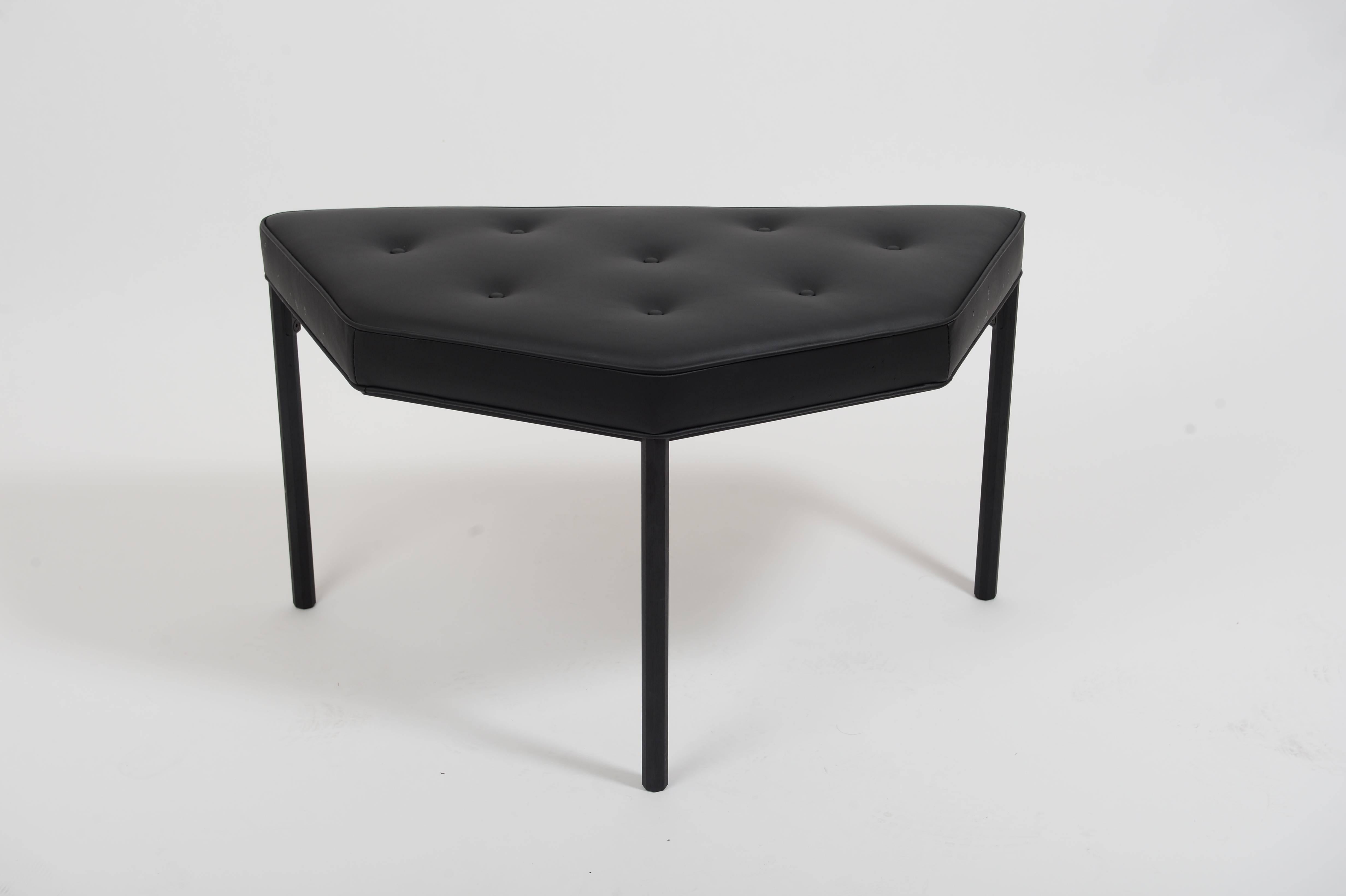 This half-octagon shaped stool is a modern take on the demilune vanity stool. Octagon-shaped legs are cnc-milled out of square aluminum solid bar, and hand brushed and anodized in satin black. Legs are connected via custom milled aluminum braces and