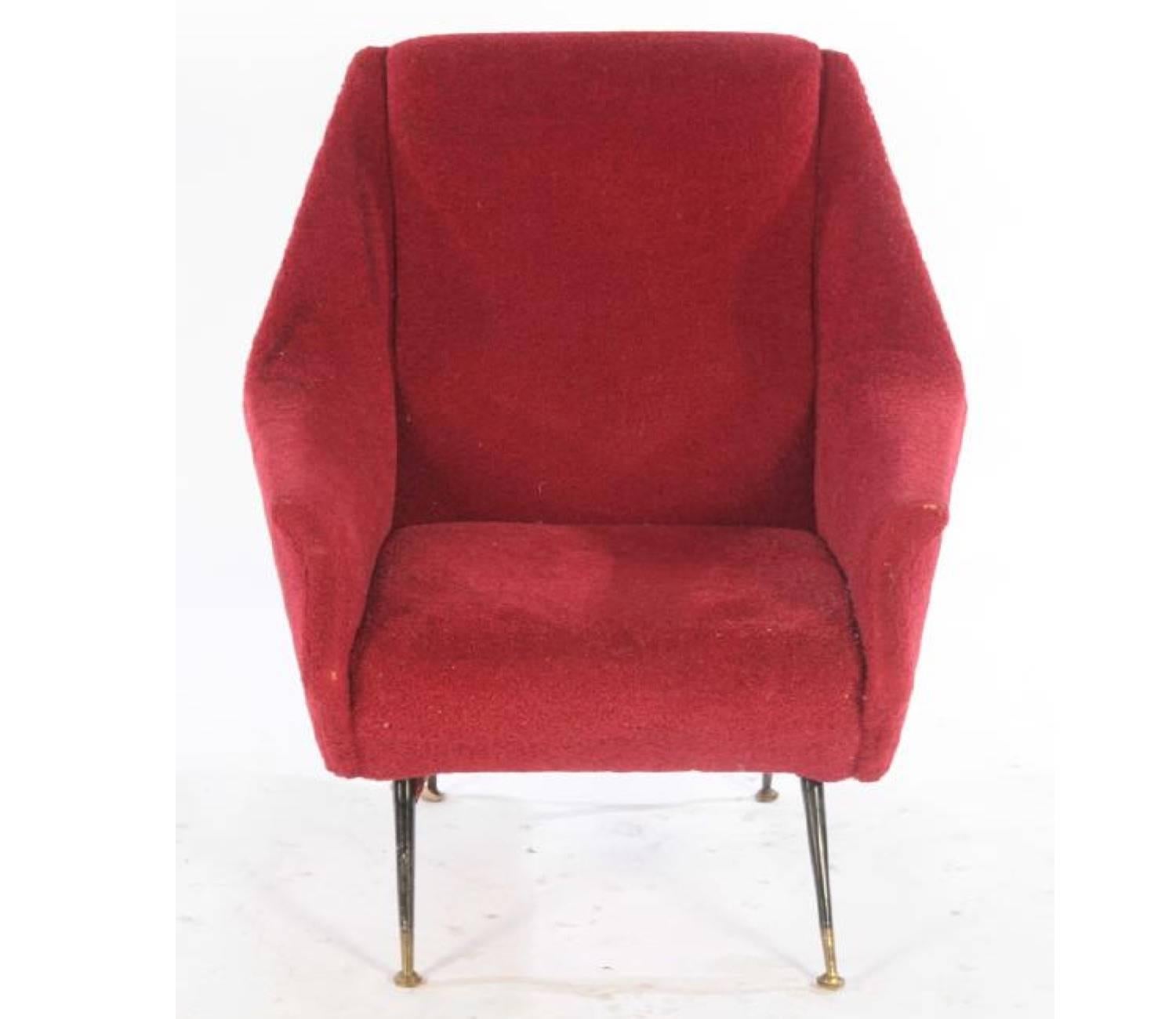 An Italian Mid-Century modern Gigi Radice upholstered club chair raised on metal legs with brass sabots, circa 1950. 

Measures: Seat height 16