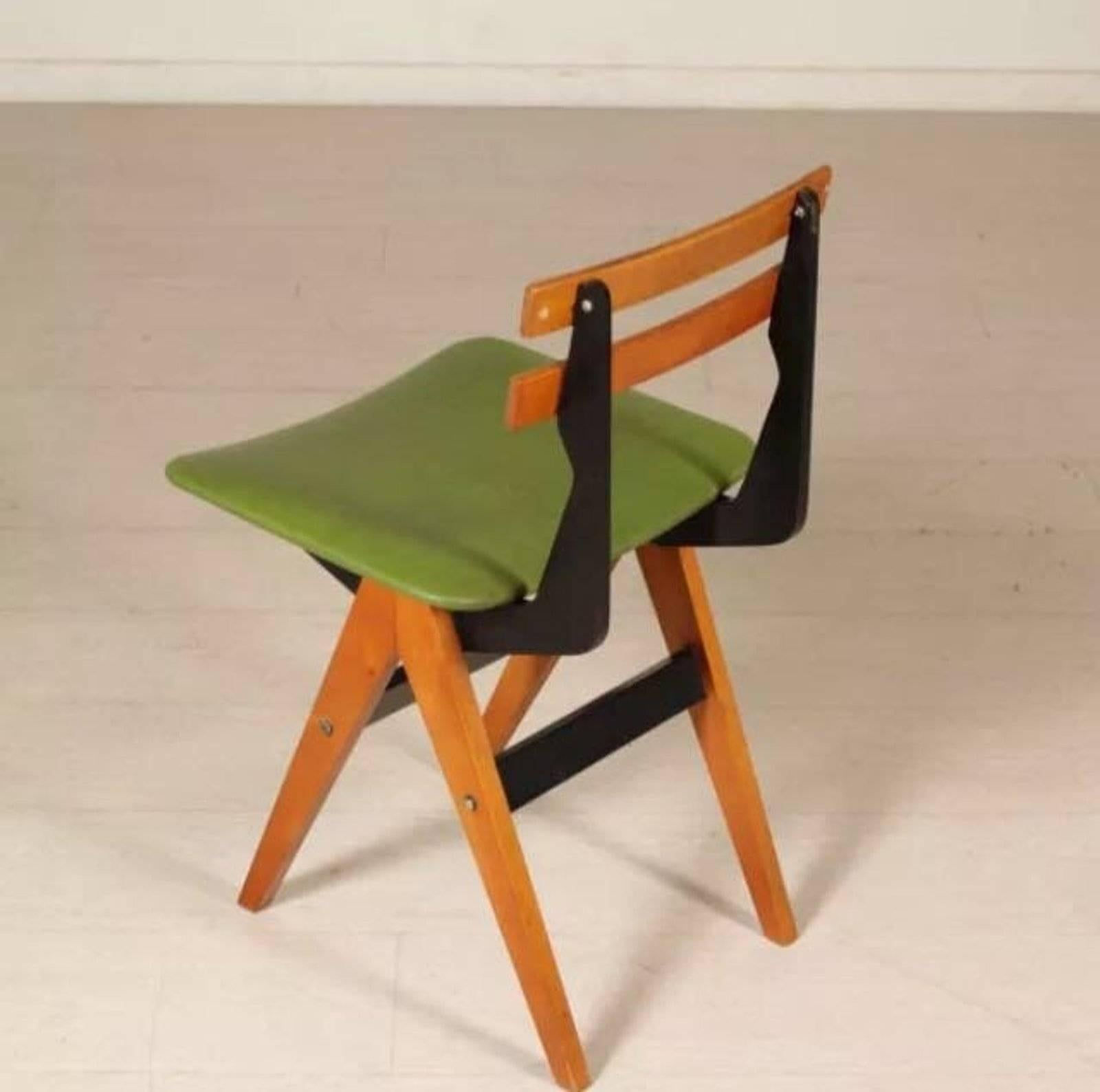 Ico and Luisa Parisi, F.lli Reguitti, is the perfect desk chair. Made of beechwood with a brass and vinyl seat, circa 1960, Italy. 

Dimensions: 26.75 x 15.75 x 16.5 cm.