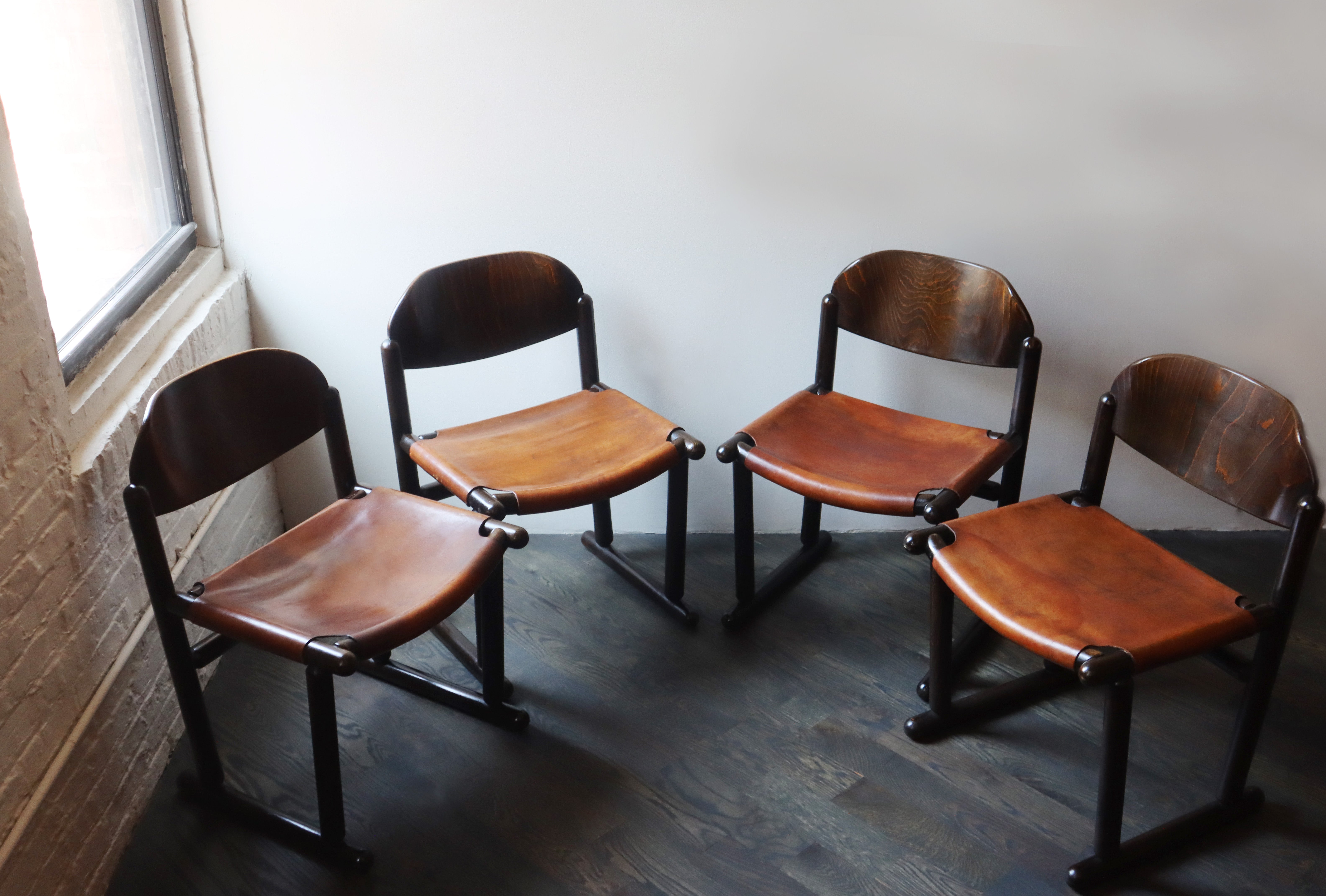 Beautiful set of vintage design chairs. Great brutalist, hunters’ chair style, very solid wooden frame with thick saddle leather seats.

Great condition. Newly Refurbished.

