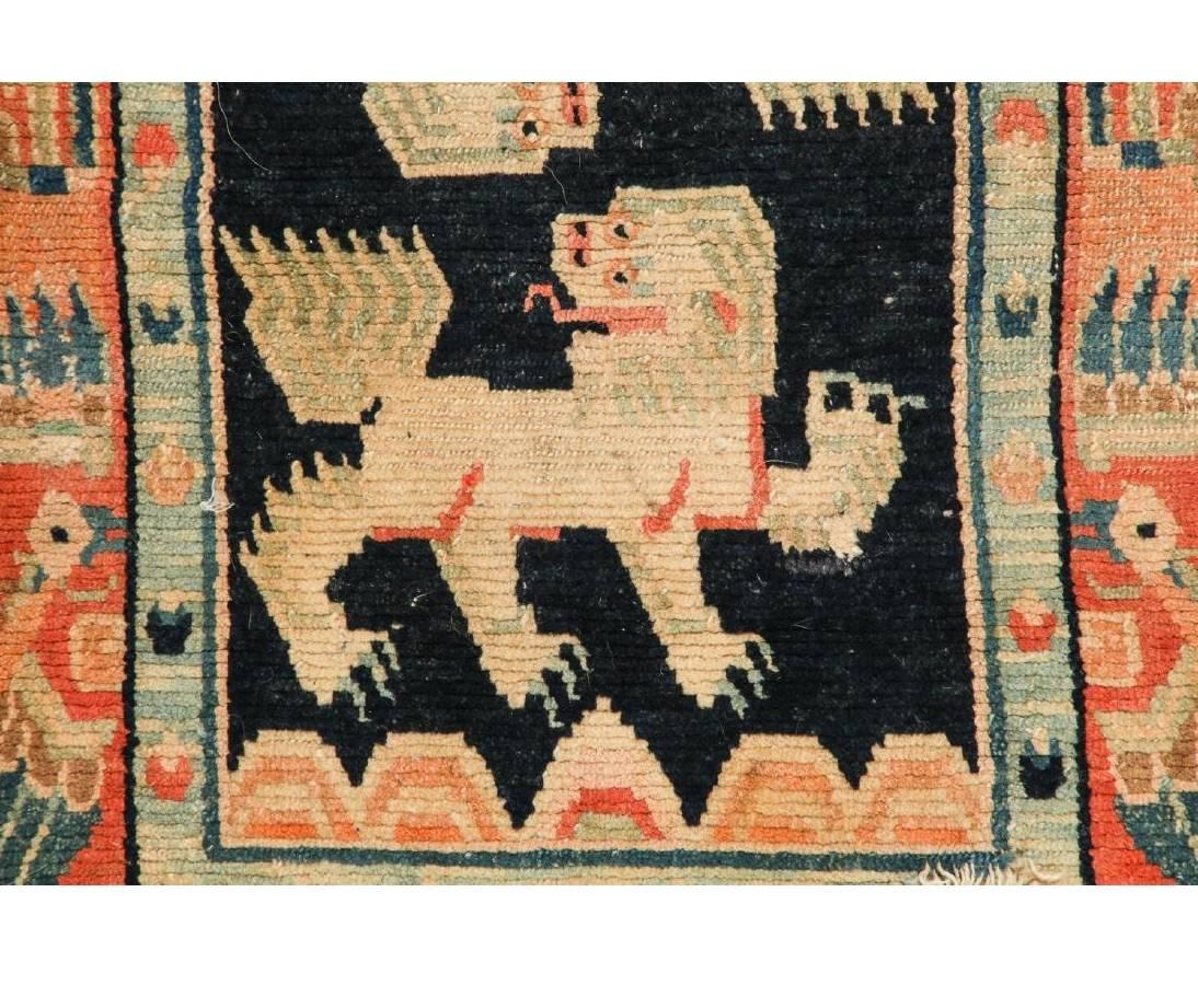 Hand-Knotted Antique Tibetan Double Snow Lion Rug