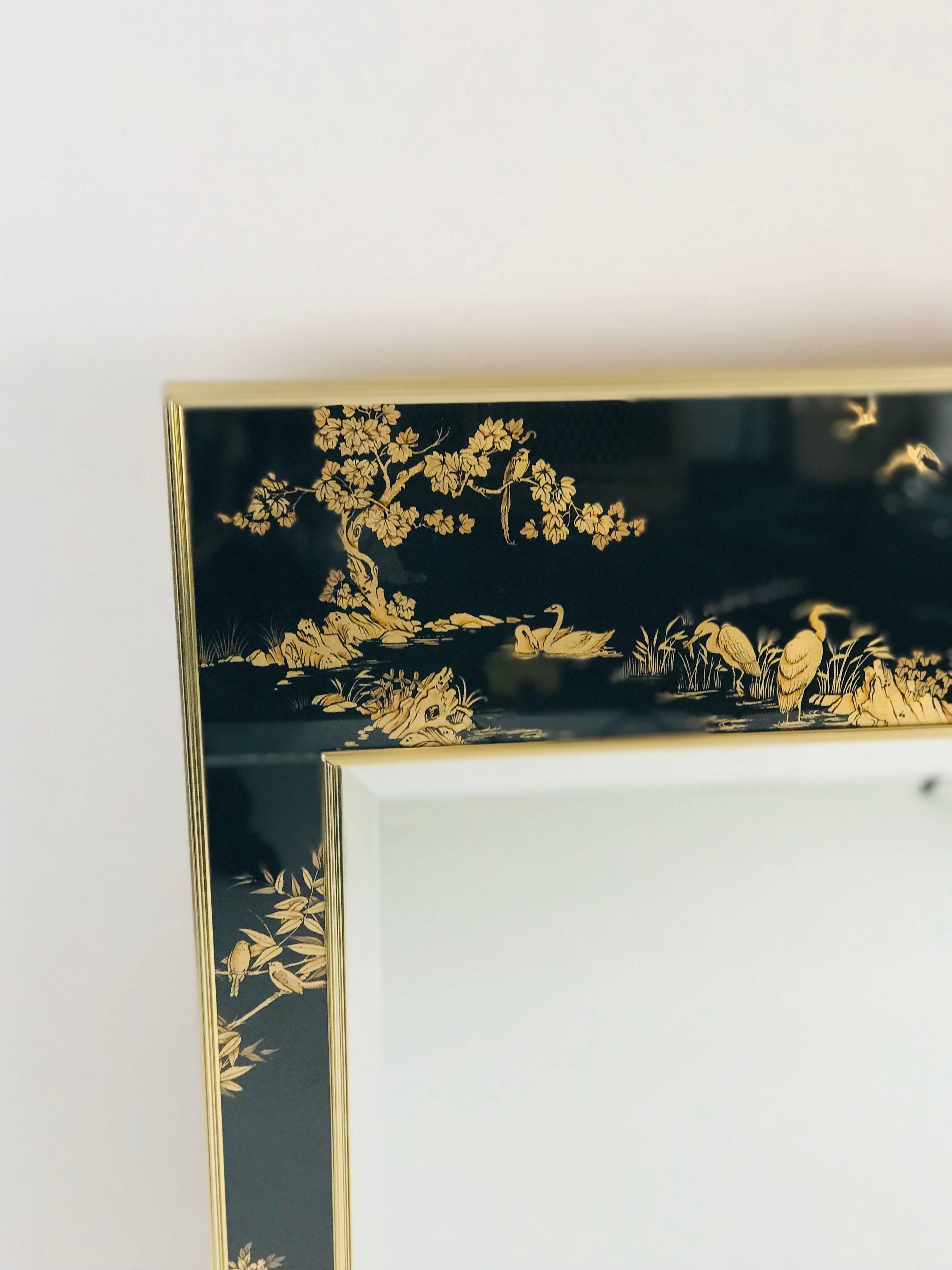 Large black and gold Labarge chinoiserie mirror. Made of brass and glass, the mirror has églomisé chinoiserie in black and gold. 

Marked on the back with sticker 