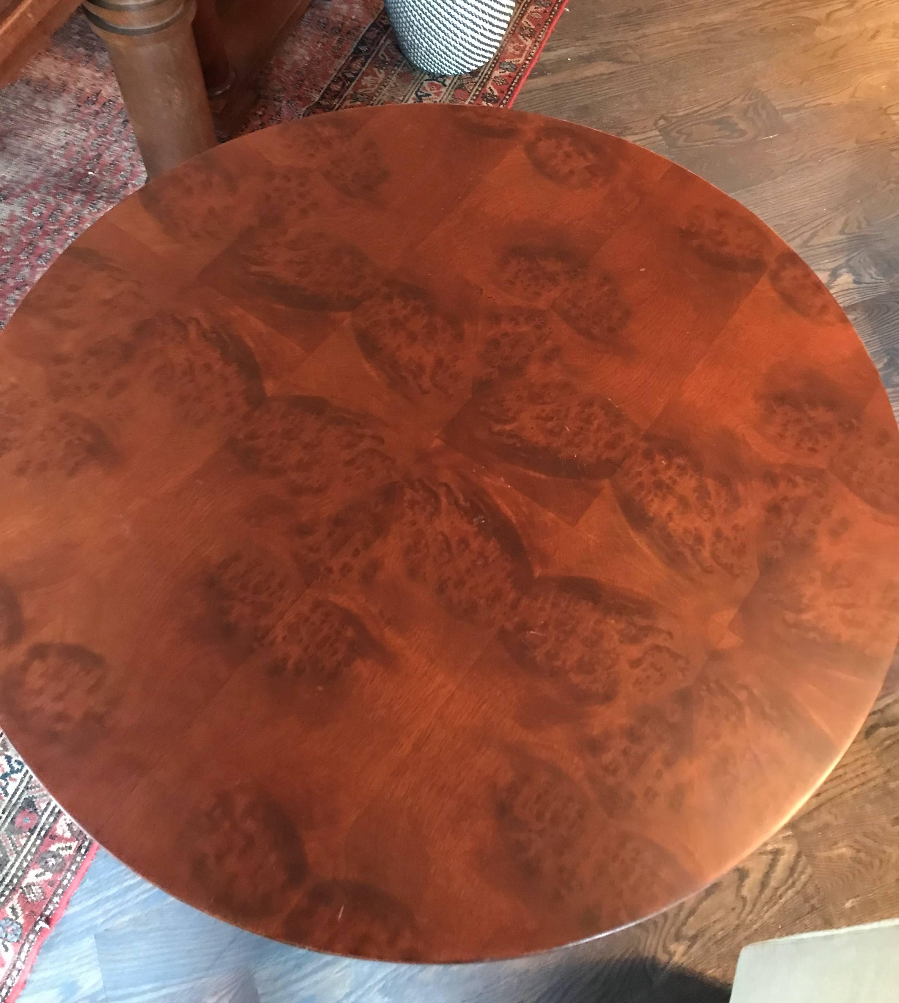 This Gilbert Rohde occasional table features richly stained wood and tapered legs. Beautiful matched veneer pattern. Beautiful condition, circa 1940.

 