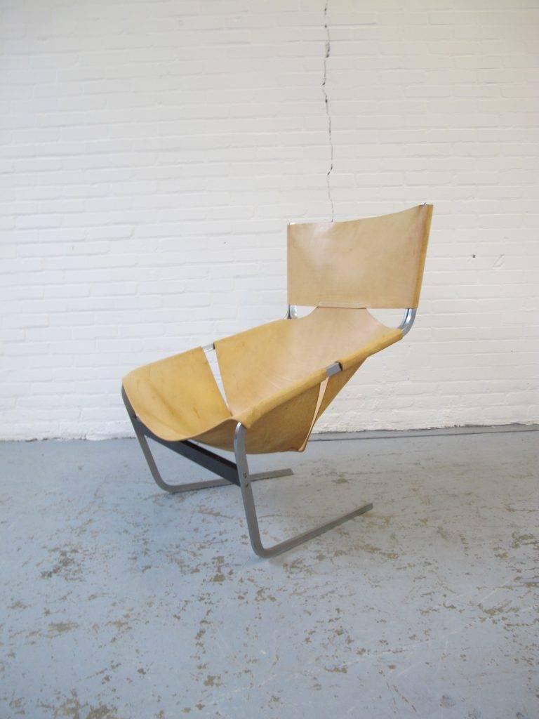 Lounge armchair type F444 by Pierre Paulin for Artifort from the 1960s. Classic Mid-Century Modern design. Simple, minimal design with cantilevered chrome-plated frame and original cognac leather. Leather in great condition, circa 1960.