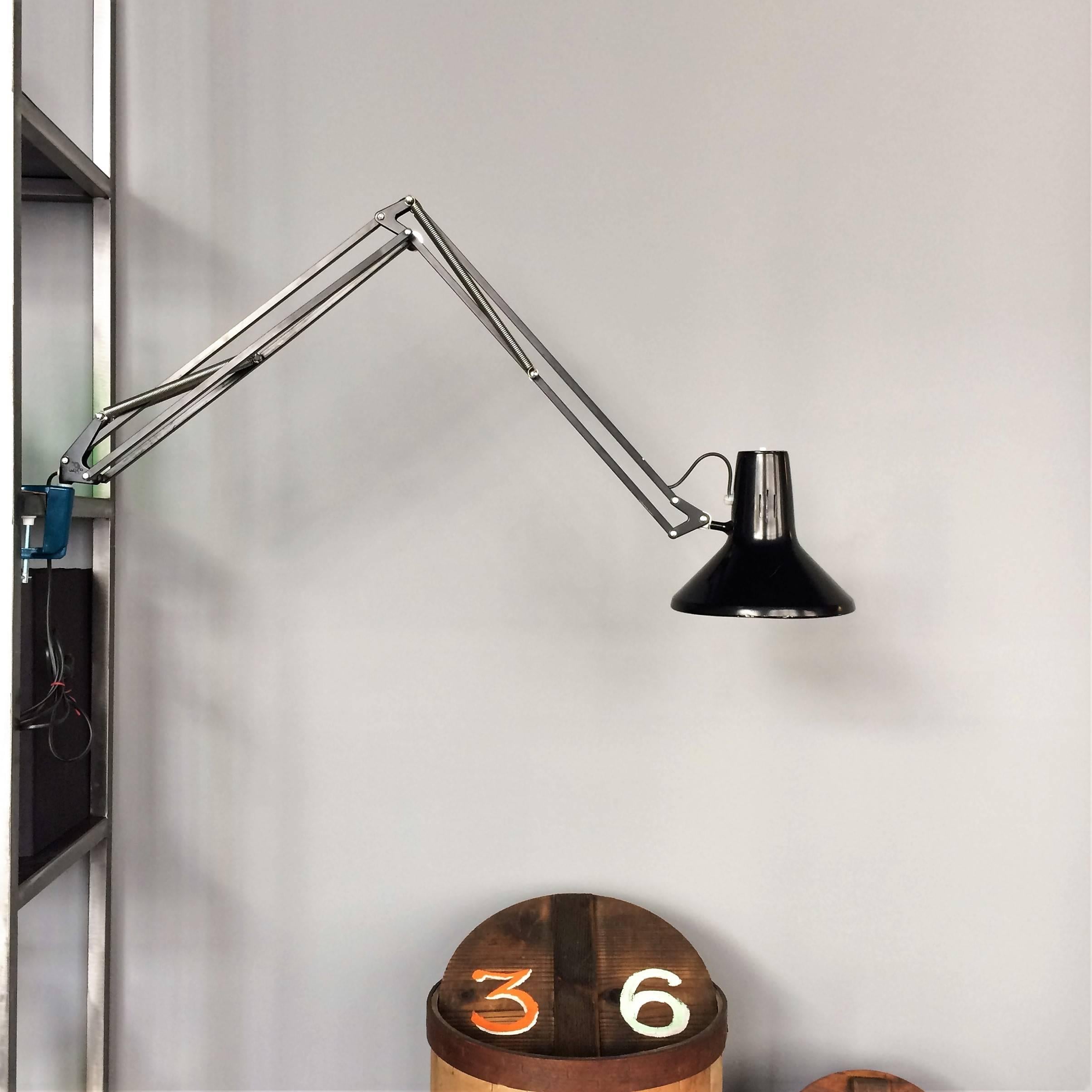 An iconic L-1P vintage Luxo architect's lamp. Great Industrial design with clean modern lines in a Classic black color, looks great on a desk. Made by the Luxo lighting company in Norway. The L-1 was designed by Jac Jacobsen in 1937.

Design period: