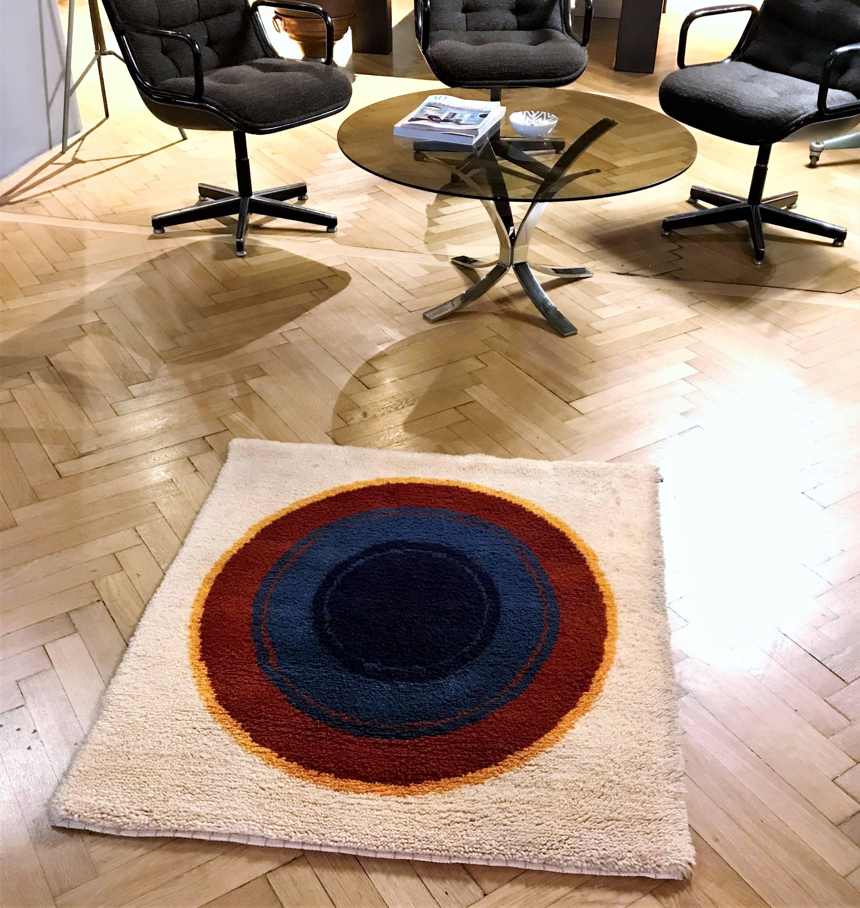 Vintage Austrian hand knotted wool carpet from the late 1970s. It was hanging on the wall since its creation. It can be also used as a floor carpet.
The creator was inspired by 20th century genius artist Kenneth Noland and his Target