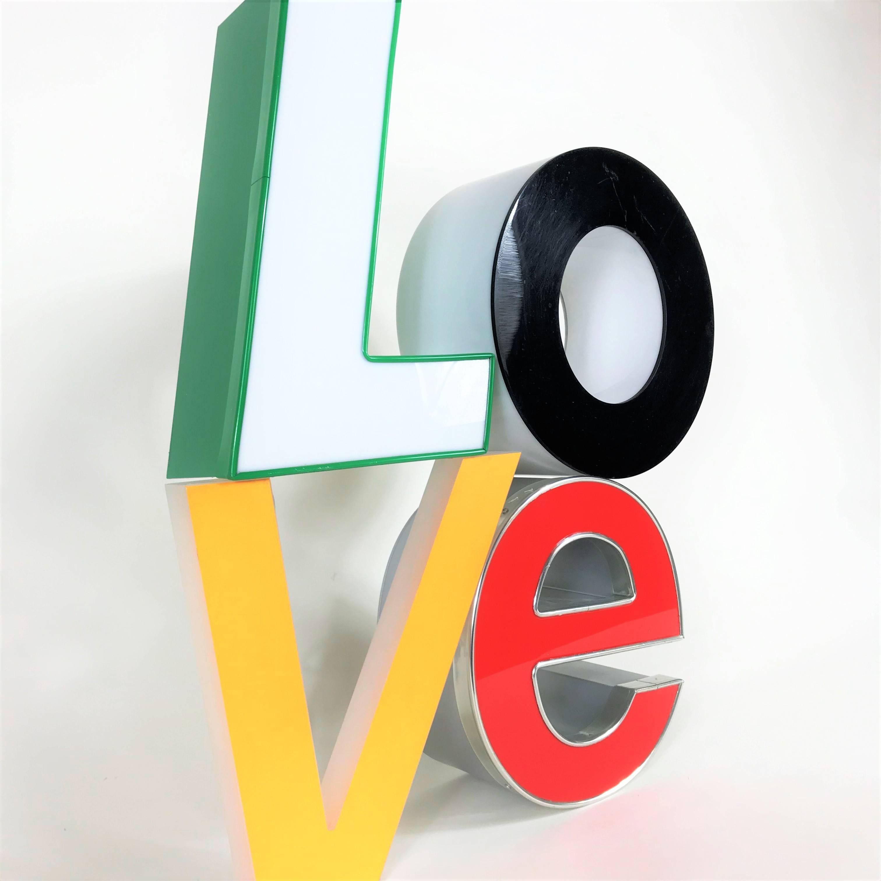 Very decorative late 20th century lighting sculpture inspired by Robert Indiana - the letters create a beautifully soft, indirect light. Completely illuminated 
Rewired with new LEDs - ready to use.
We have more than 500 signs and letters in stock,