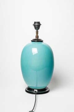Blue glazed ceramic table lamp by Raoul Lachenal, circa 1940-1950.
