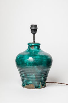 Green glazed ceramic table lamp by Marcel Guillot, circa 1930-1940.