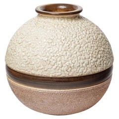 Glazed stoneware vase attributed to Louis Dage, circa 1930.