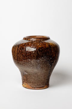 Brown glazed stoneware vase by Pierre Digan, circa 1970.