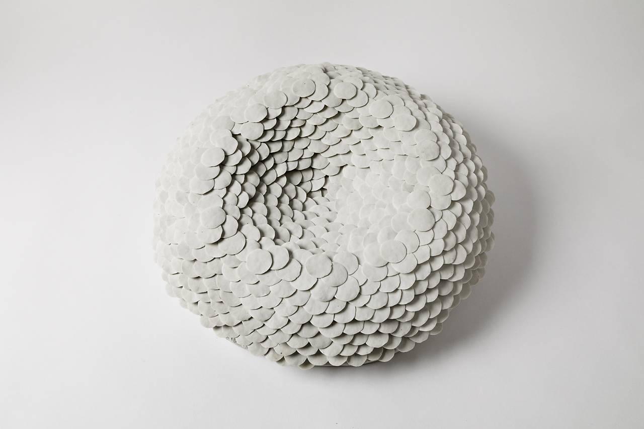 A wall porcelain sculpture entitled 